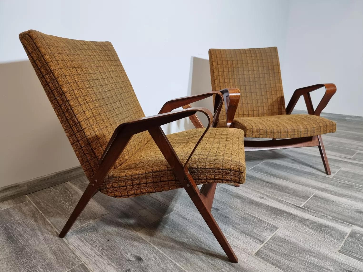 Pair of armchairs, dark brown plywood, by F. Jirak, Tatra Nabytok, Czechoslovakia, 1960s. - 48829