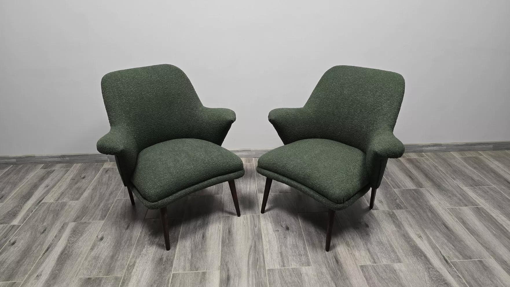 Pair of armchairs, olive, bouclé, dark wood, Poland, 1960s. - 48701