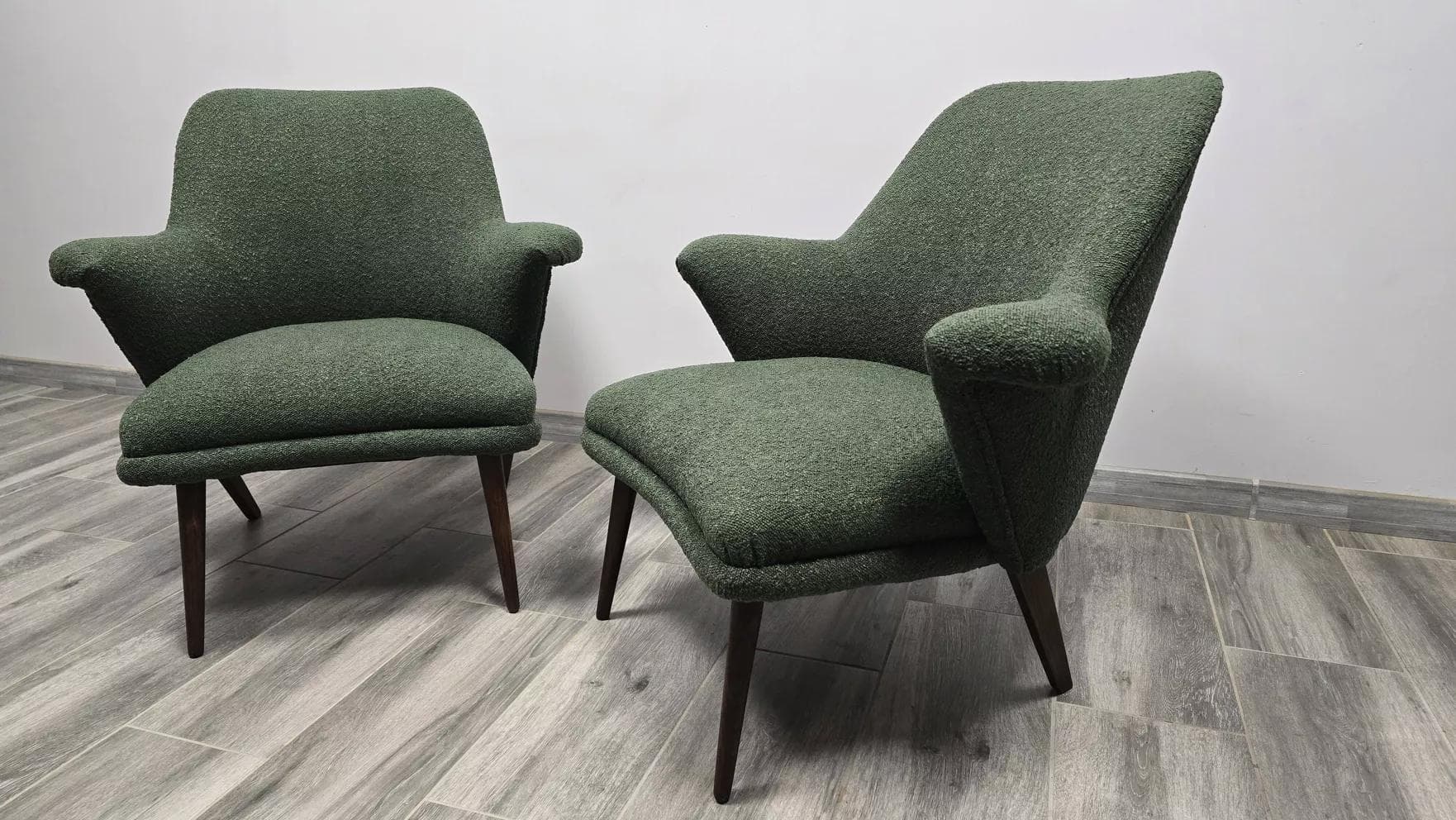 Pair of armchairs, olive, bouclé, dark wood, Poland, 1960s. - 48702