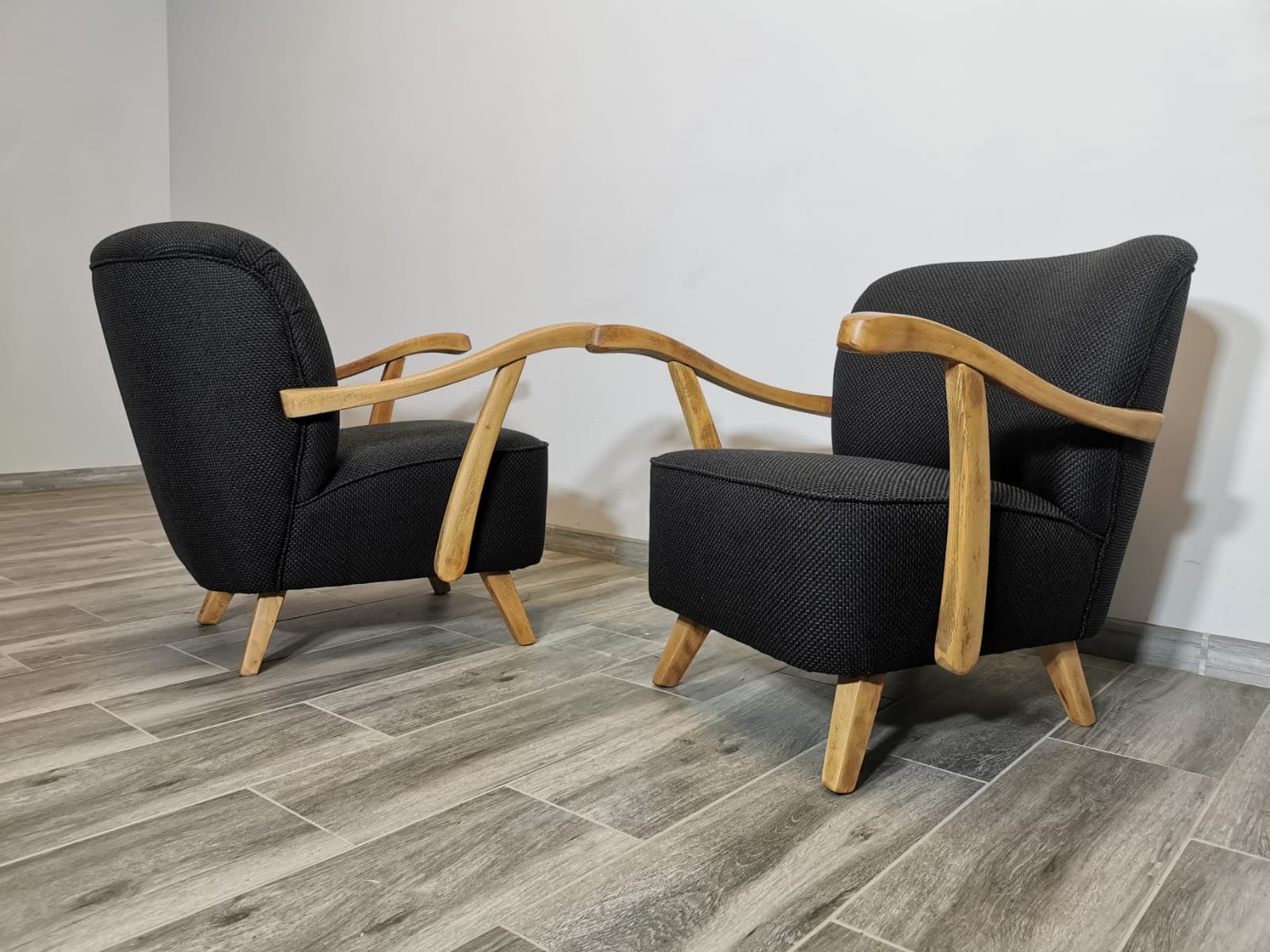 Pair of armchairs, black, wood, Czechoslovakia, 1960s. - 48661