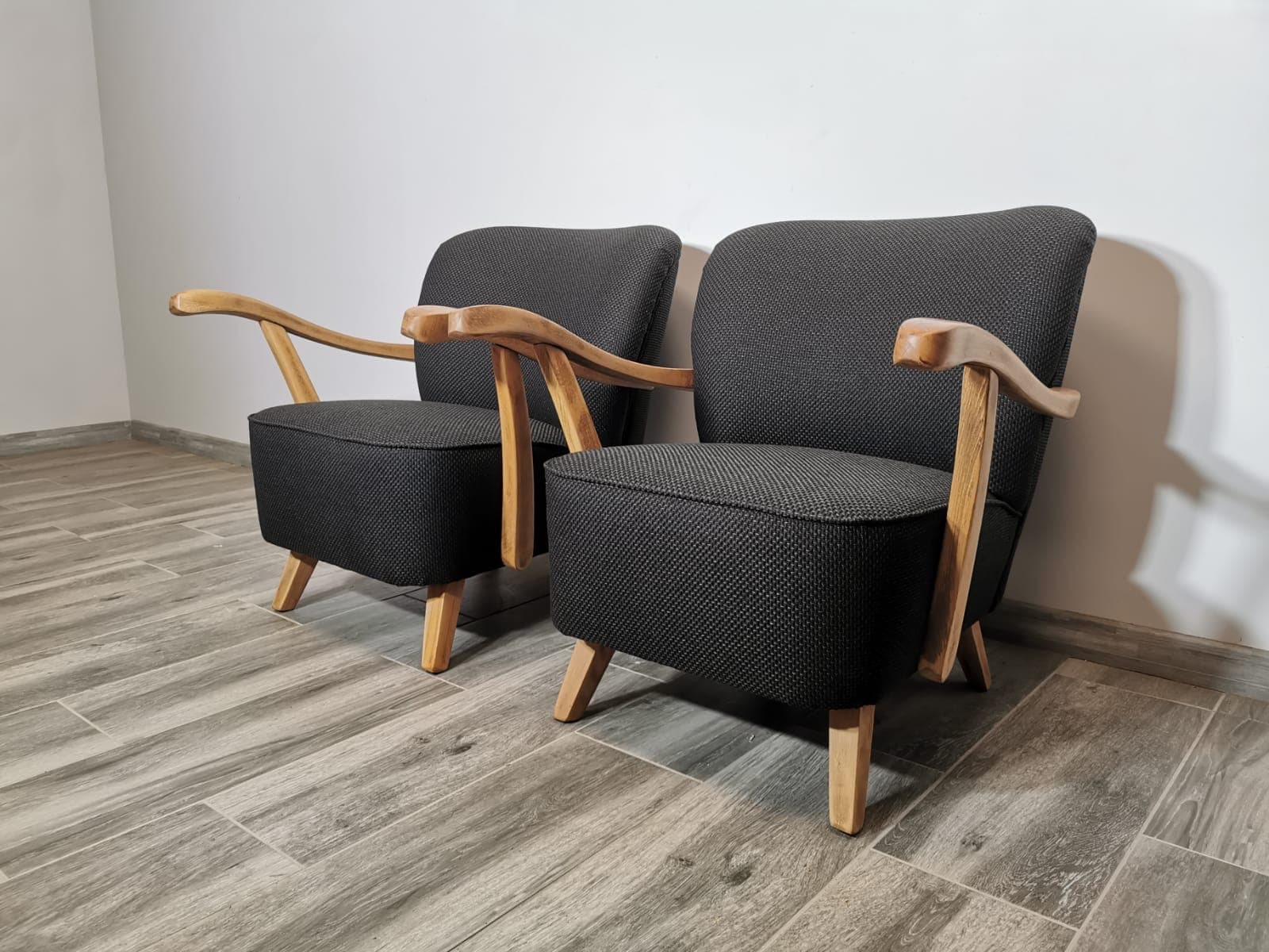 Pair of armchairs, black, wood, Czechoslovakia, 1960s. - 48663