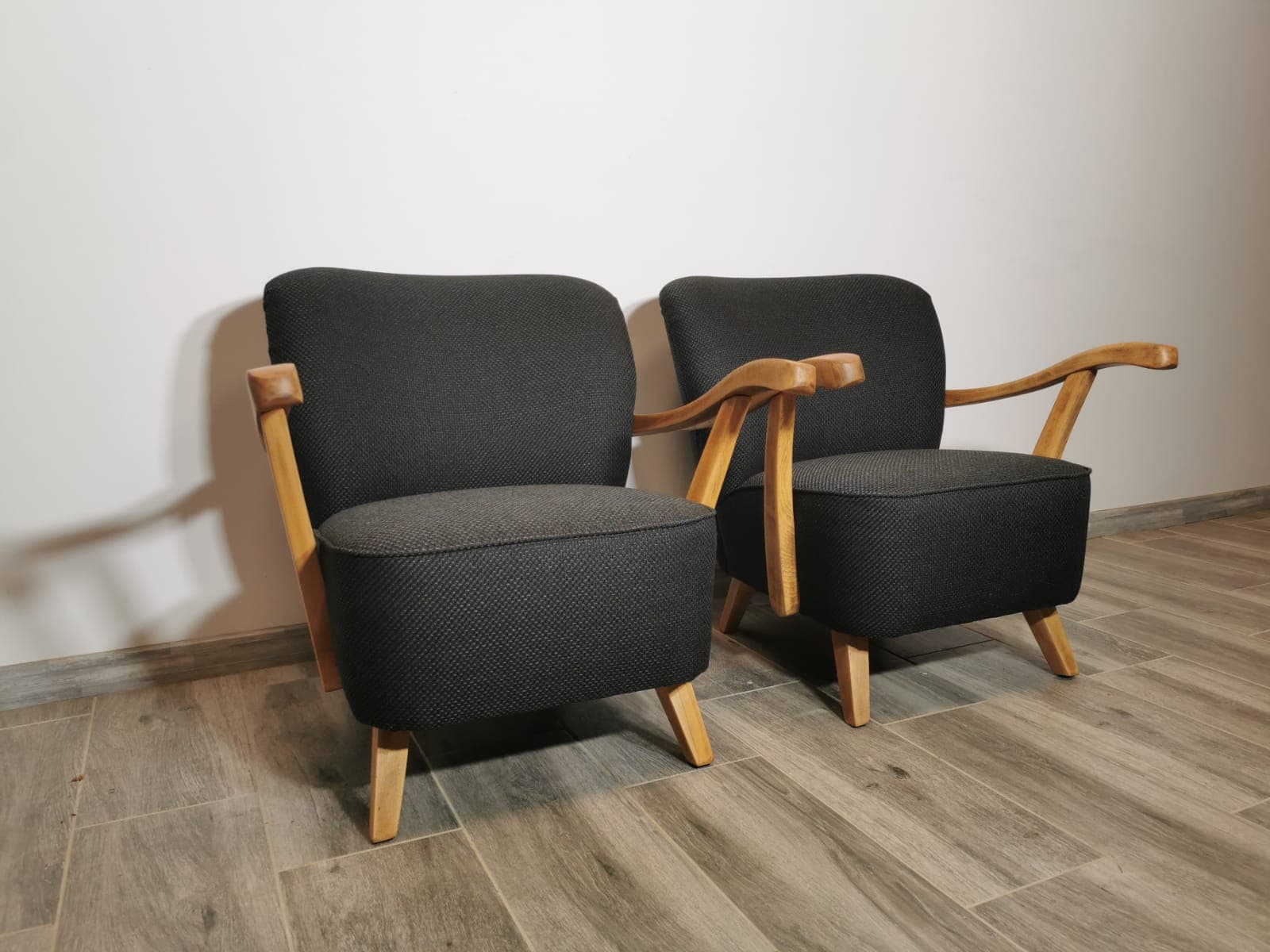 Pair of armchairs, black, wood, Czechoslovakia, 1960s. - 48662