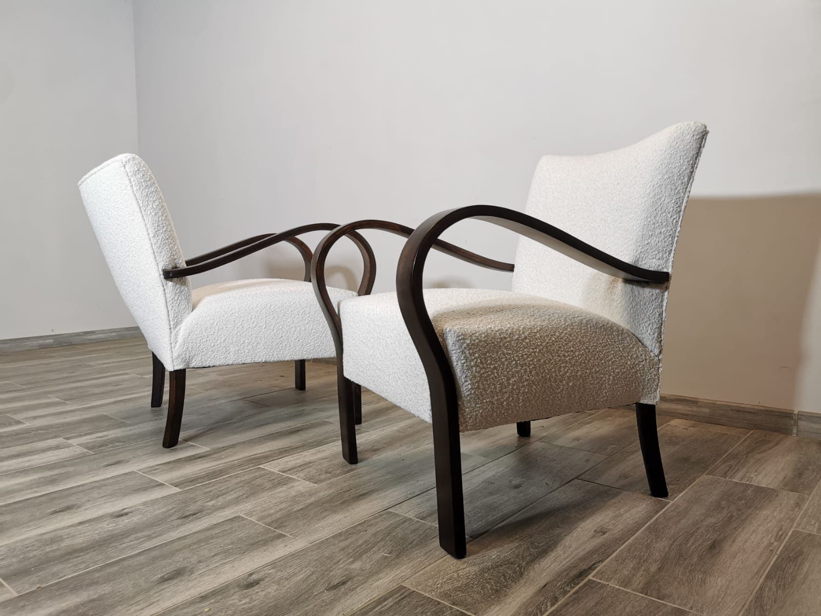 Pair of armchairs, white bouclé, dark brown wood, Czechoslovakia, 1950s. - 48651