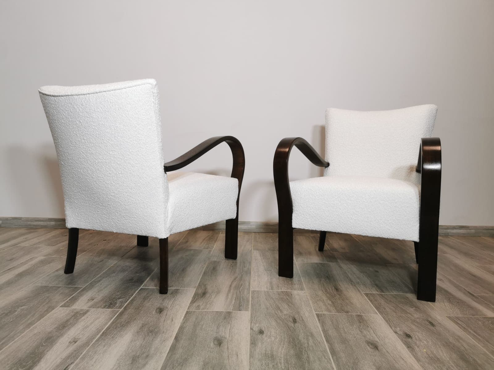 Pair of armchairs, white bouclé, dark brown wood, Czechoslovakia, 1950s. - 48650
