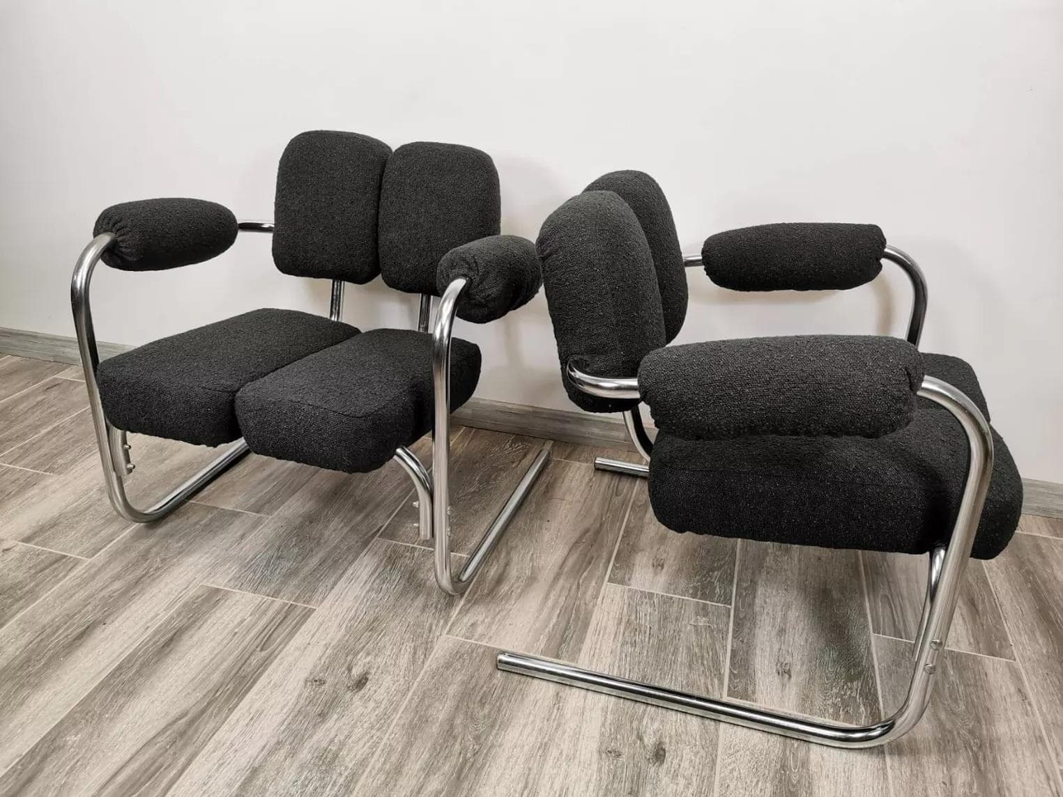 Pair of armchairs, mid-century, black bouclé, chrome steel, 1970s. - 48601