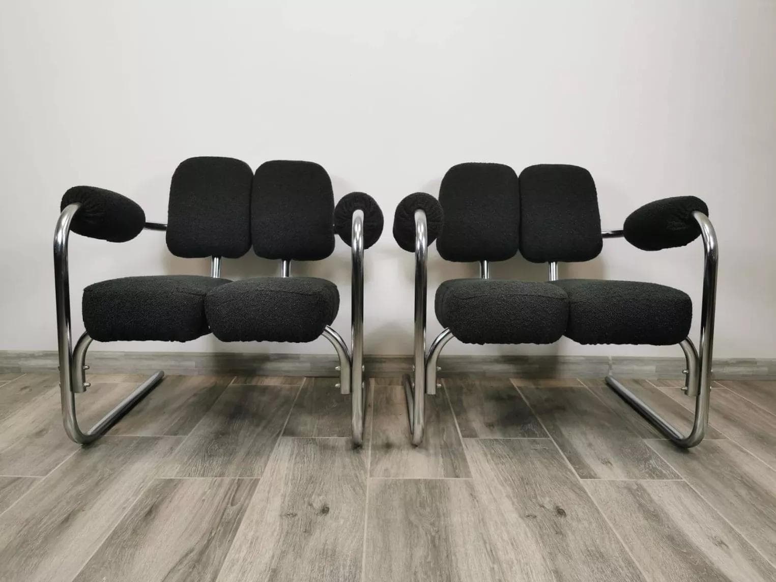 Pair of armchairs, mid-century, black bouclé, chrome steel, 1970s. - 48603