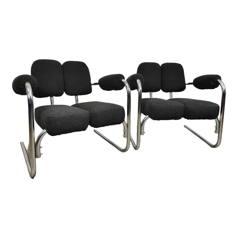Pair of armchairs, mid-century, black bouclé, chrome steel, 1970s.