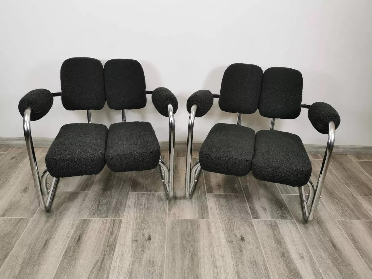 Pair of armchairs, mid-century, black bouclé, chrome steel, 1970s. - 48602