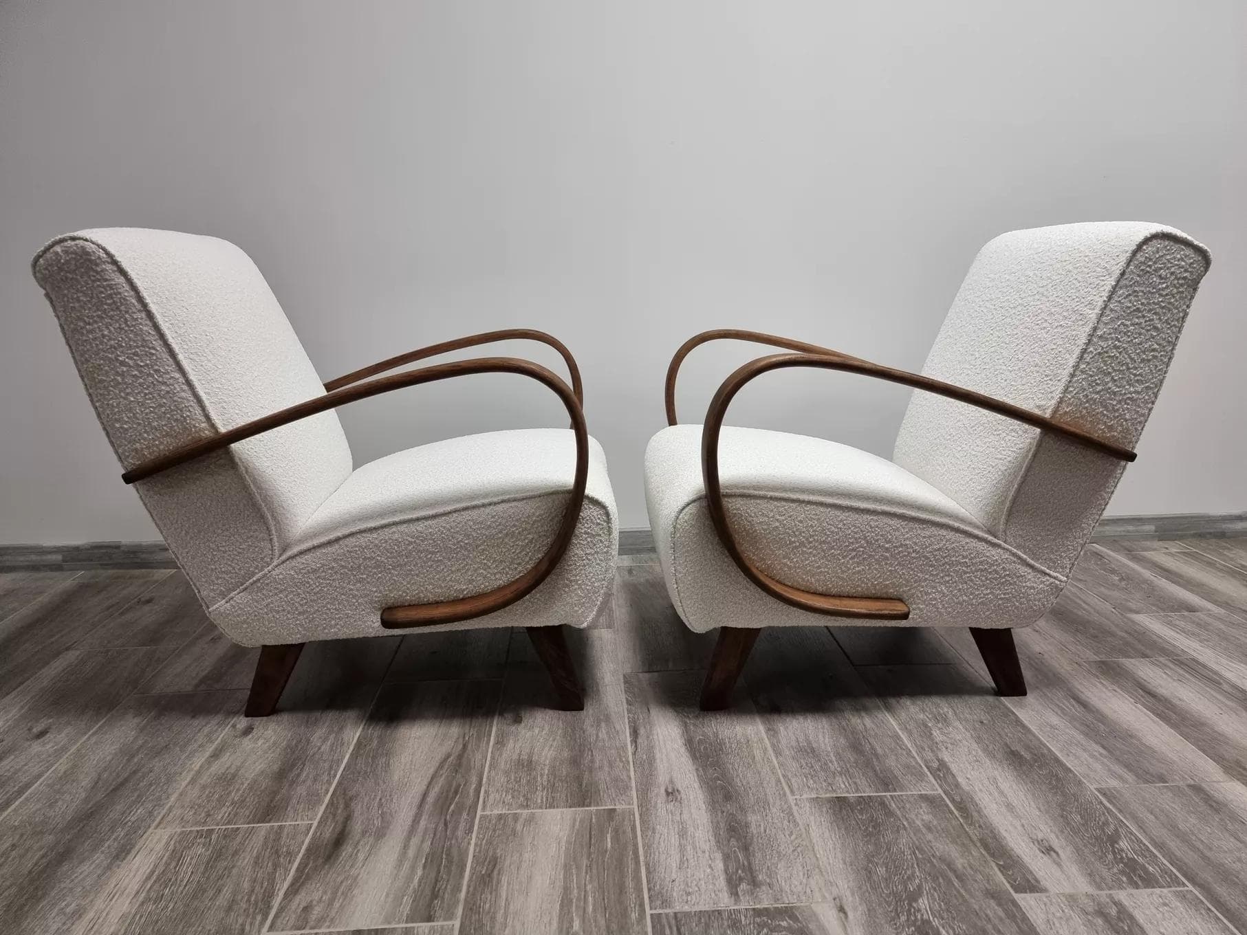 Pair of armchairs H 410, ivory bouclé, walnut wood, by J. Halabala, UP Závody, Czechoslovakia, 1960s. - 48448
