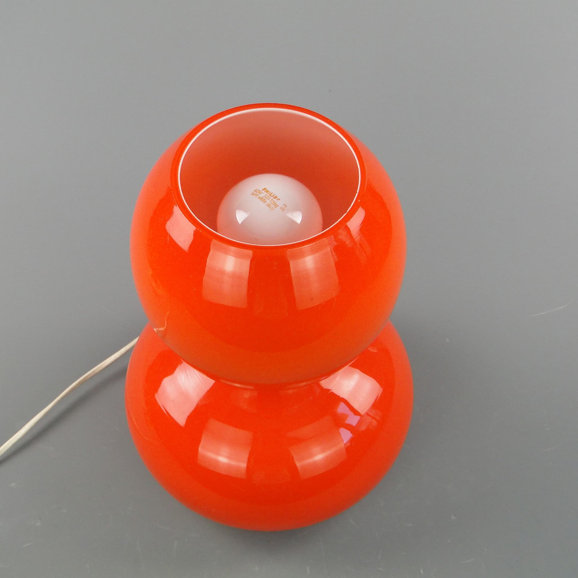 Table lamp Space Age, orange glass, Zakłady Sprzętu Oświetleniowego Zaos, Poland, 1970s. - 60170