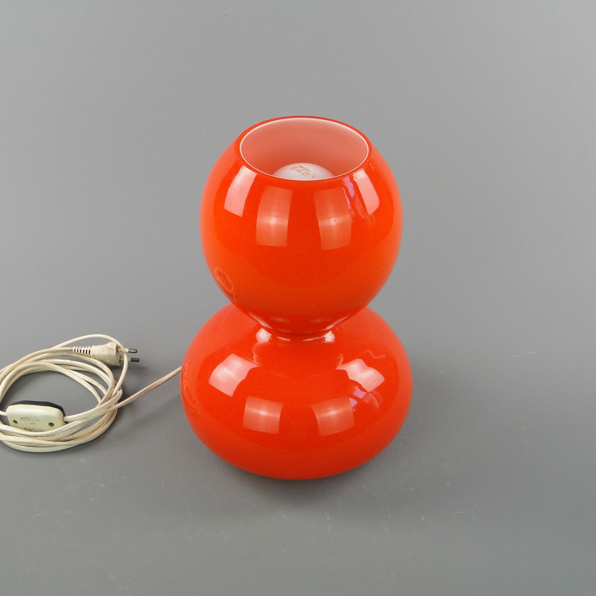 Table lamp Space Age, orange glass, Zakłady Sprzętu Oświetleniowego Zaos, Poland, 1970s. - 60167