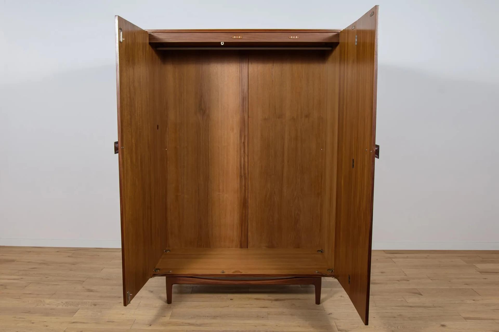 Three-door wardrobe, dark brown teak, by I. Kofod-Larsen, G-Plan, United Kingdom, 1960s. - 71554