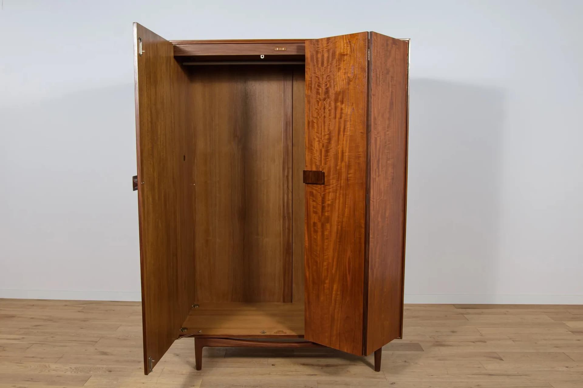 Three-door wardrobe, dark brown teak, by I. Kofod-Larsen, G-Plan, United Kingdom, 1960s. - 71553