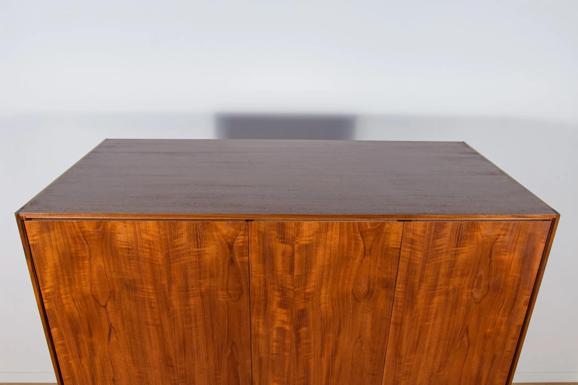 Three-door wardrobe, dark brown teak, by I. Kofod-Larsen, G-Plan, United Kingdom, 1960s. - 71557