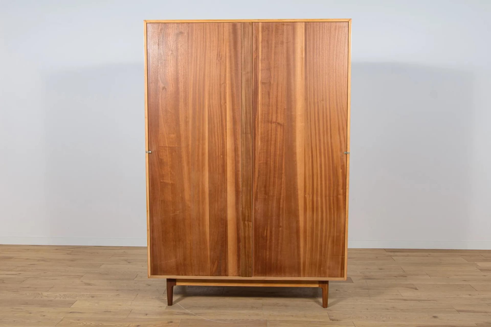 Three-door wardrobe, dark brown teak, by I. Kofod-Larsen, G-Plan, United Kingdom, 1960s. - 71555
