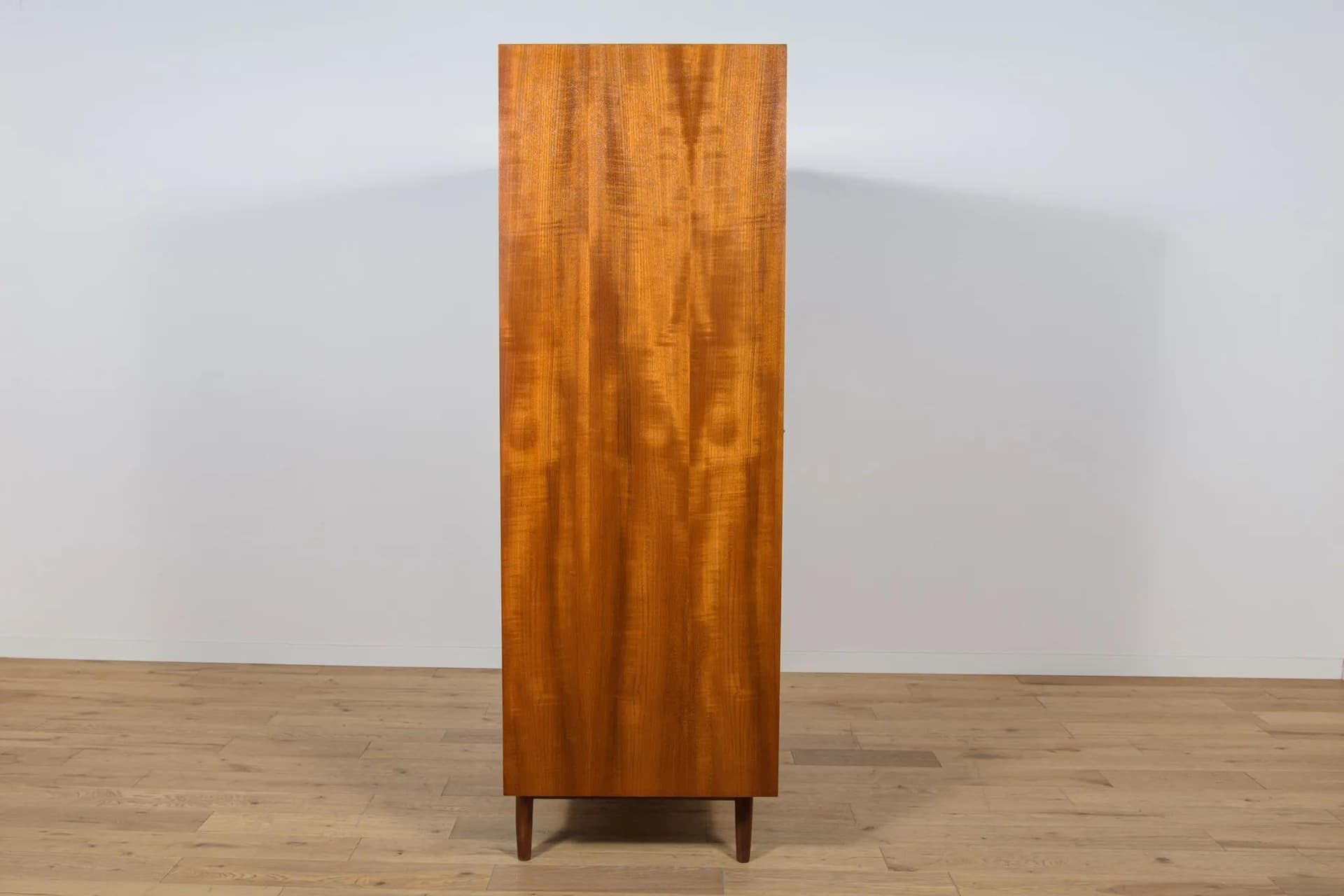 Three-door wardrobe, dark brown teak, by I. Kofod-Larsen, G-Plan, United Kingdom, 1960s. - 71556