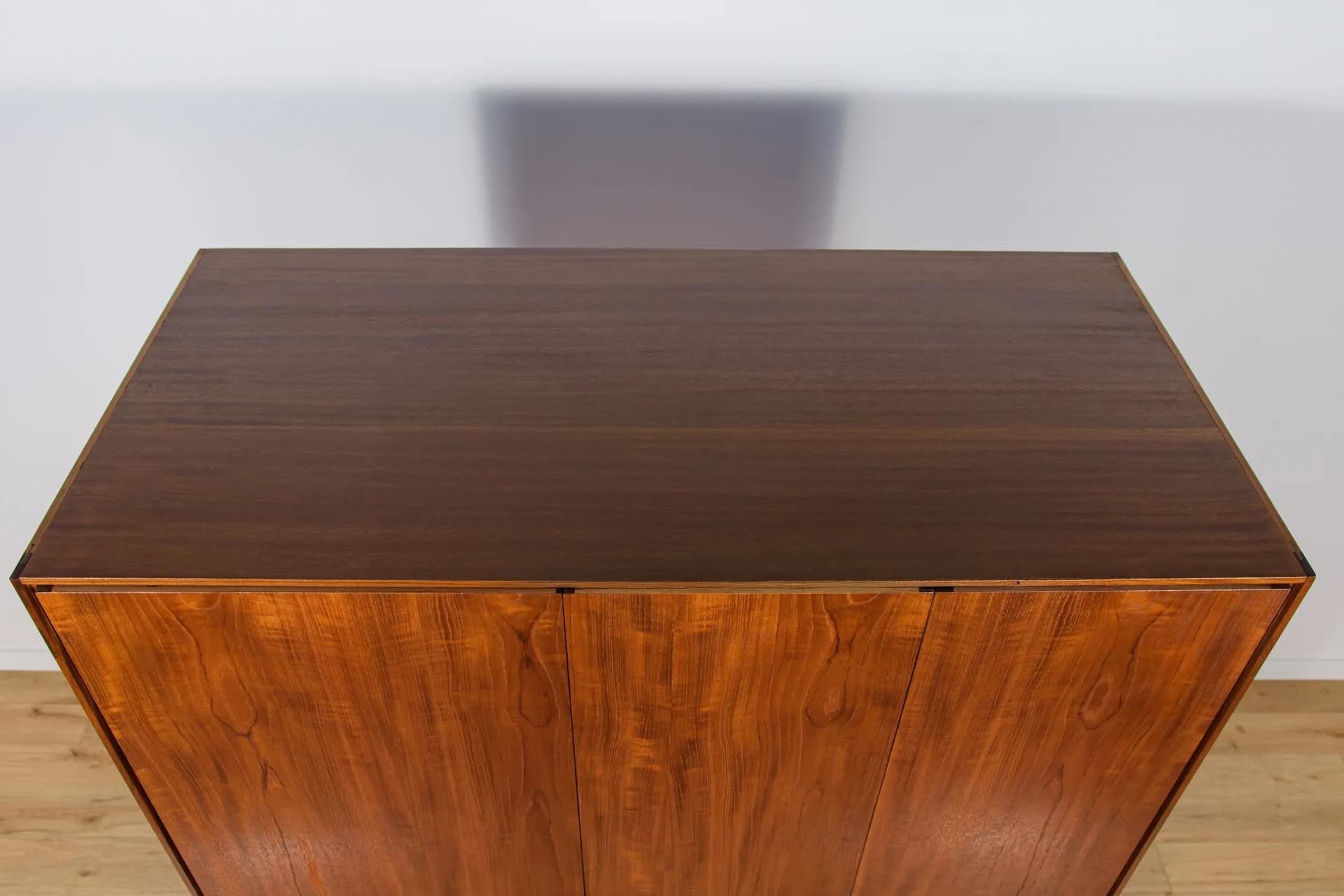 Three-door wardrobe, dark brown teak, by I. Kofod-Larsen, G-Plan, United Kingdom, 1960s. - 71552