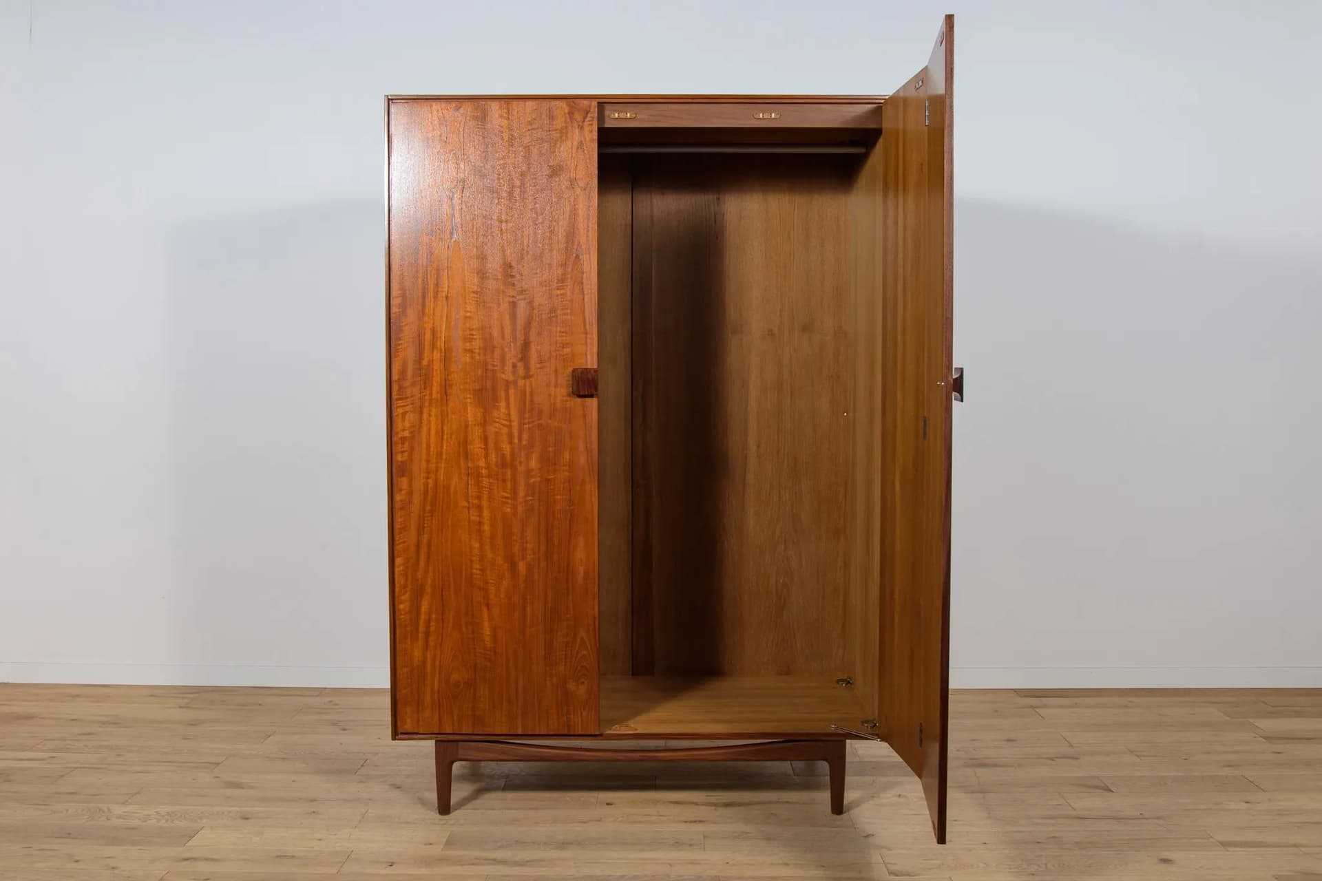 Three-door wardrobe, dark brown teak, by I. Kofod-Larsen, G-Plan, United Kingdom, 1960s. - 71558