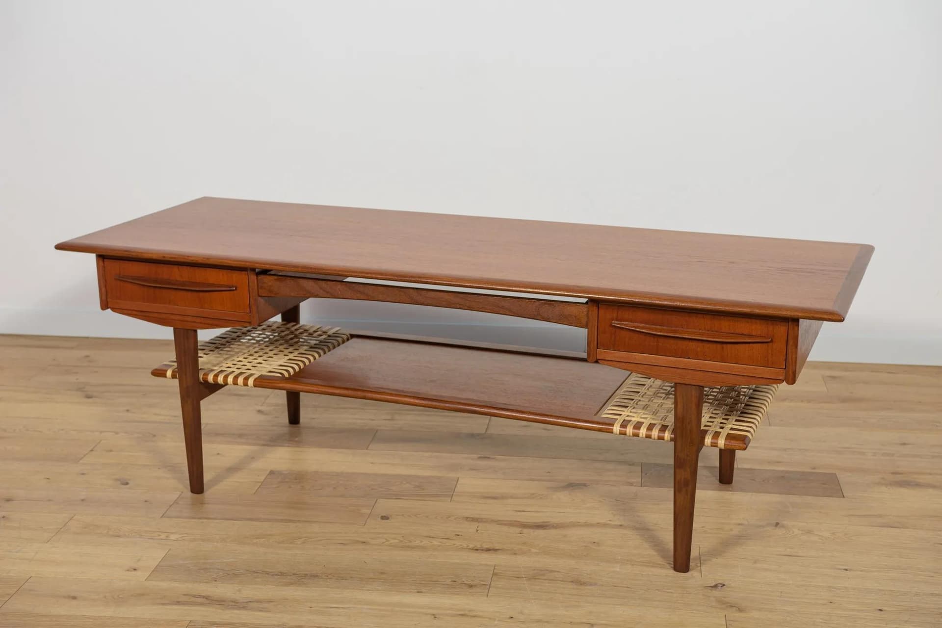 Coffee table, brown teak, rattan, Denmark, 1960s. - 70717