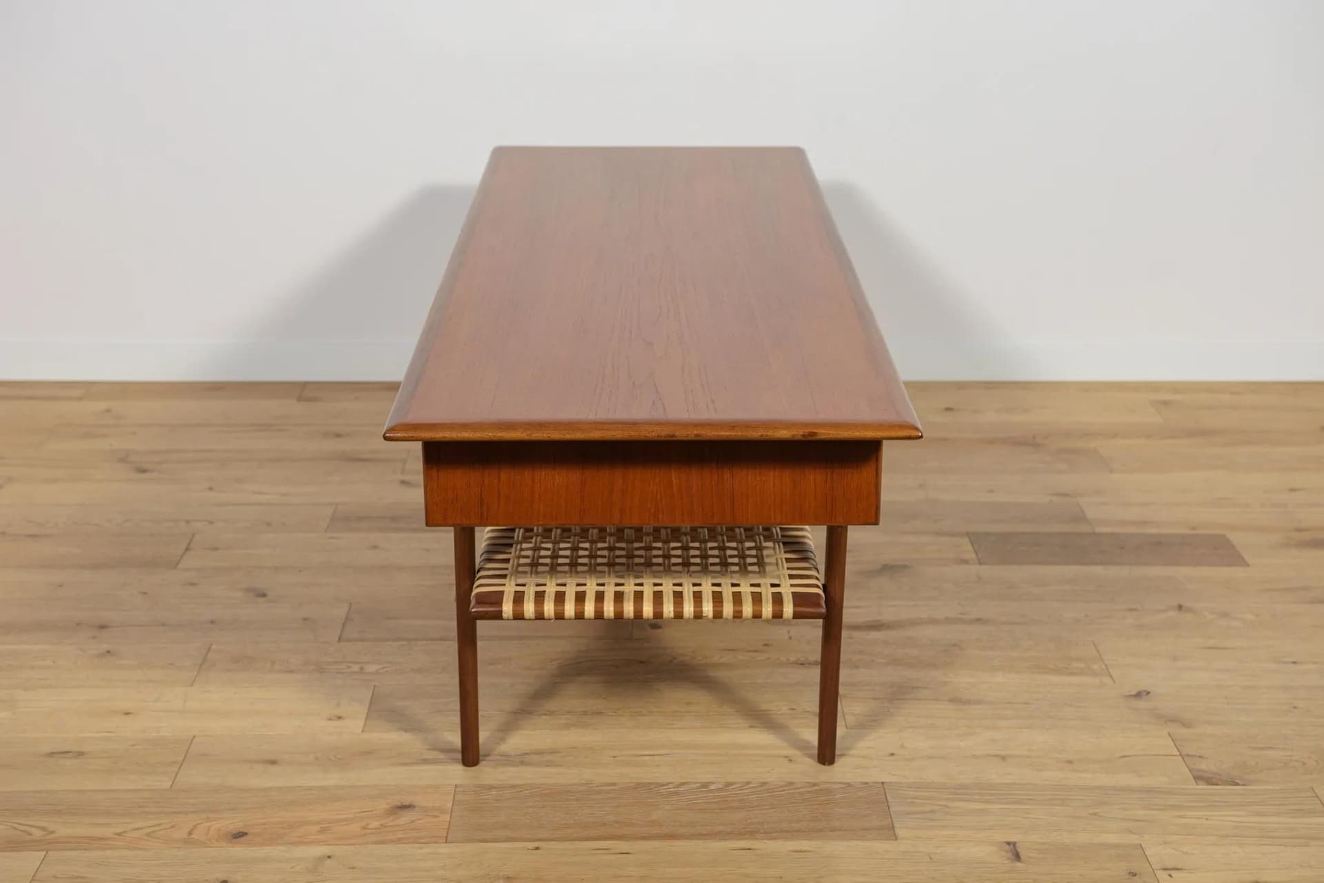 Coffee table, brown teak, rattan, Denmark, 1960s. - 70715