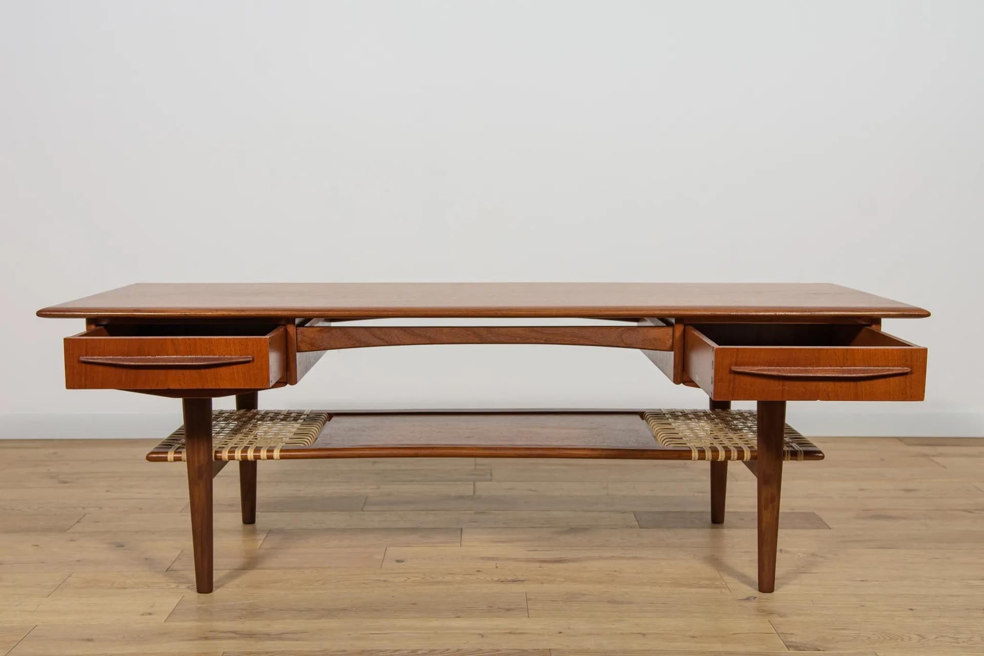 Coffee table, brown teak, rattan, Denmark, 1960s. - 70719