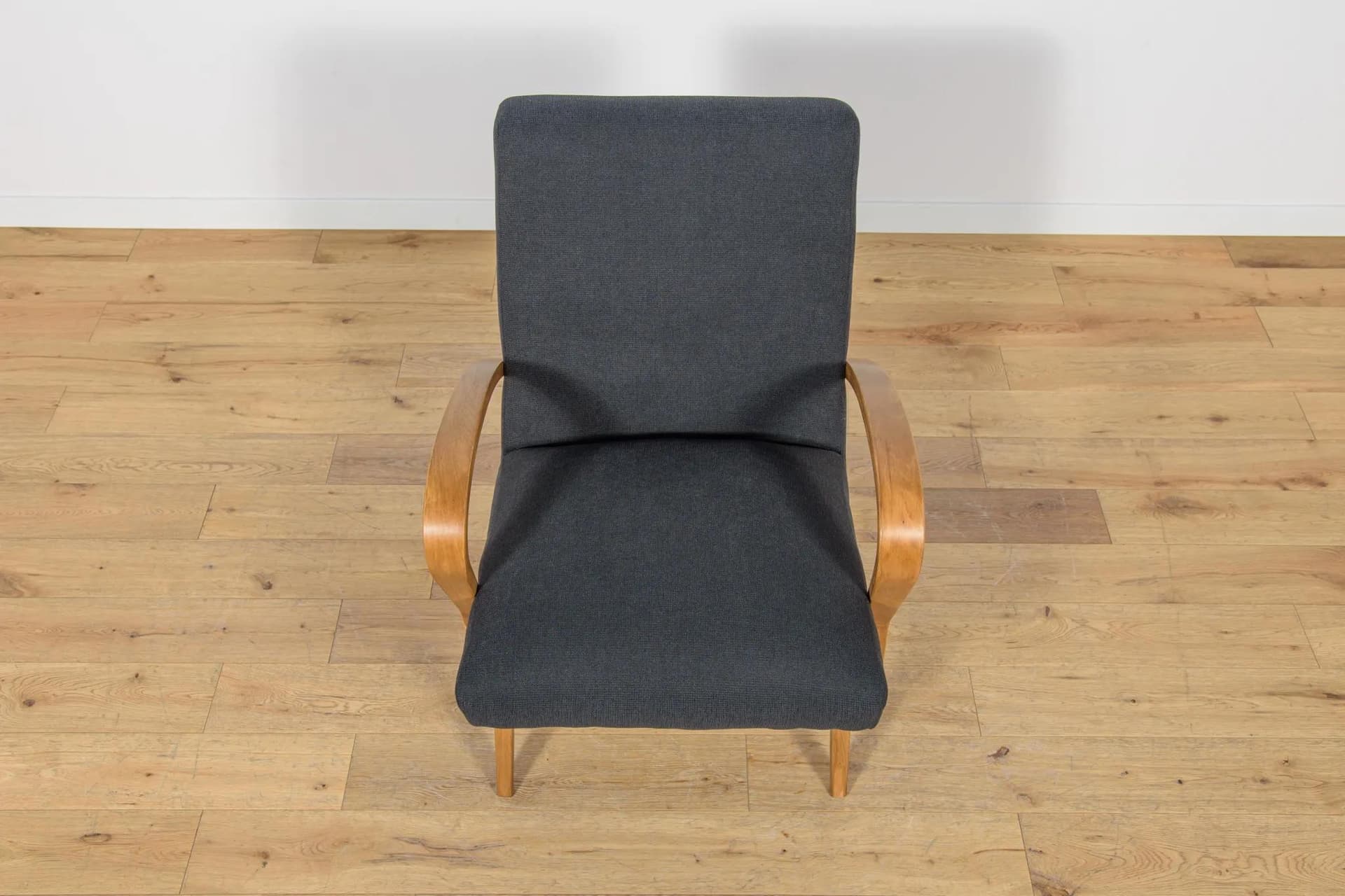 Armchair, light brown wood, black fabric, Czechoslovakia, 1960s - 72674