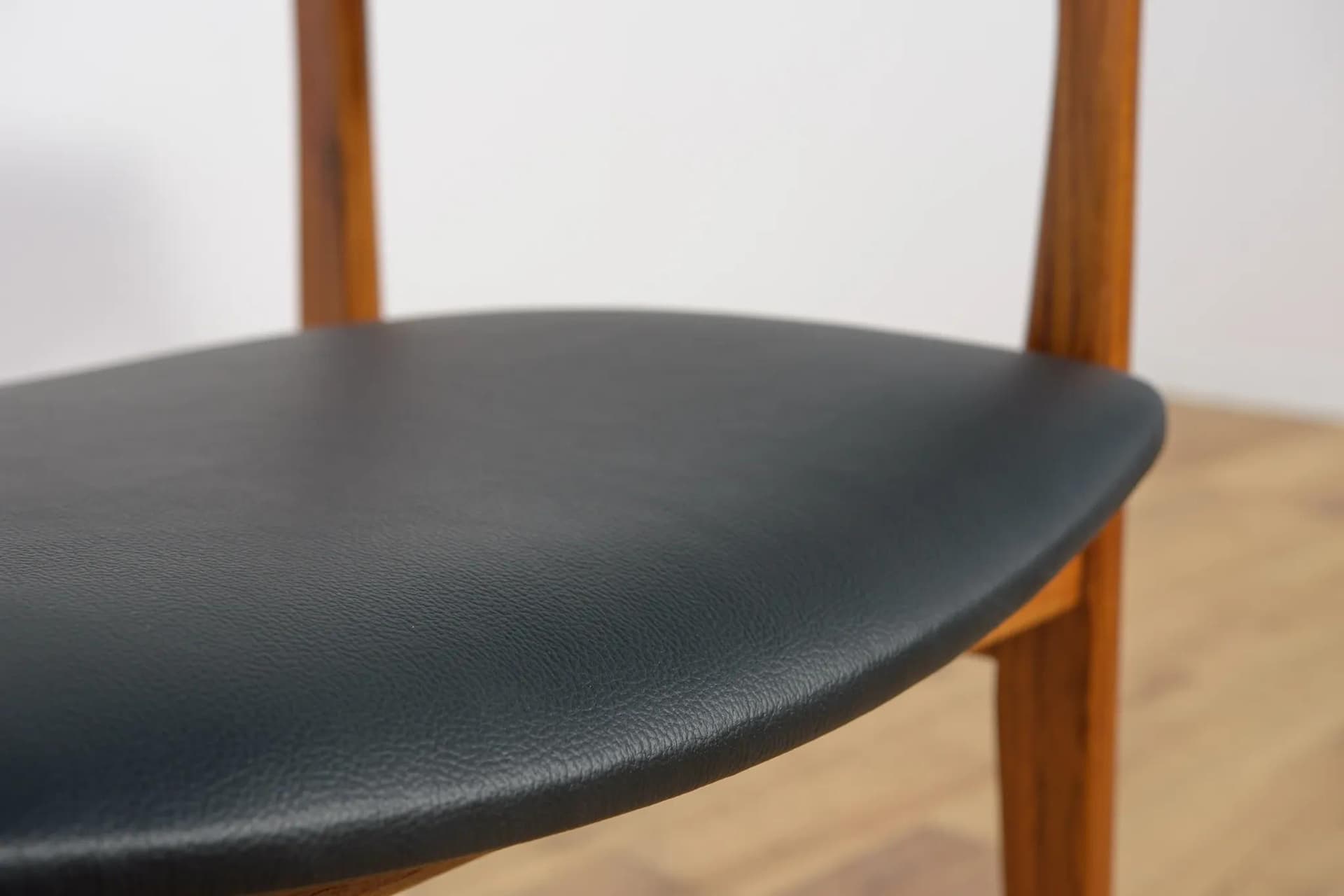 Armchair, brown teak, black leather, Denmark, 1960s. - 73836