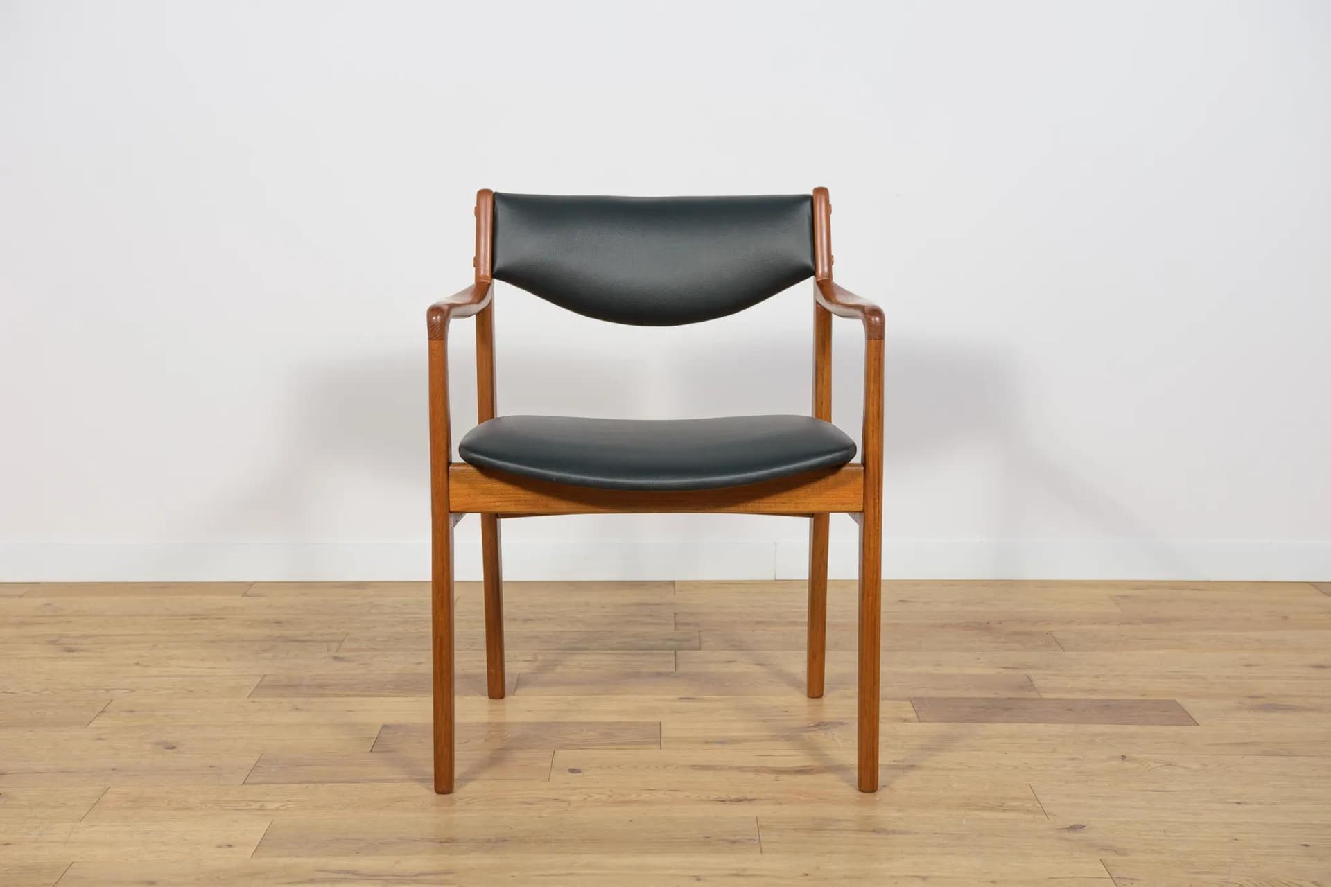 Armchair, brown teak, black leather, Denmark, 1960s. - 73834