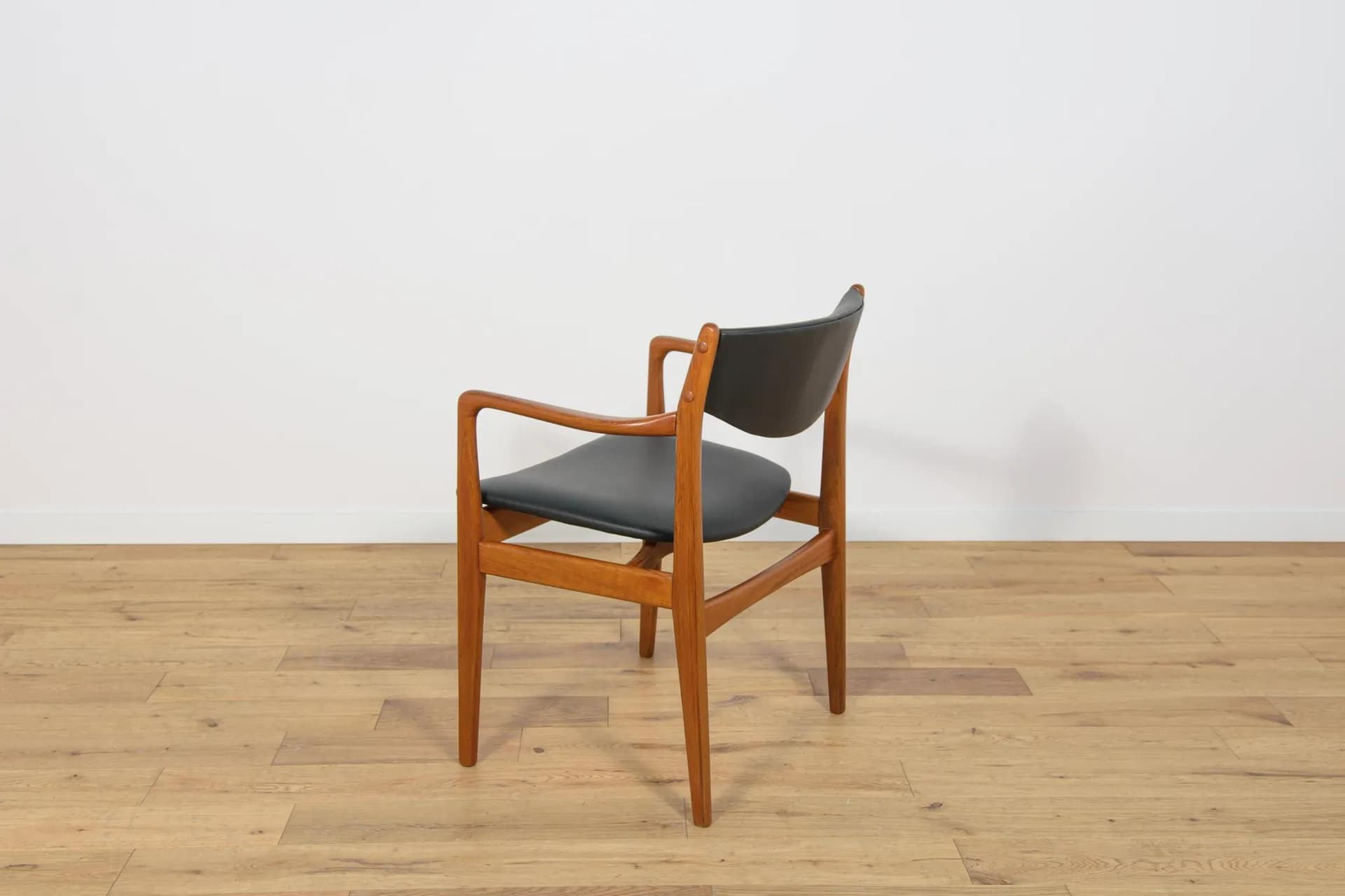 Armchair, brown teak, black leather, Denmark, 1960s. - 73837