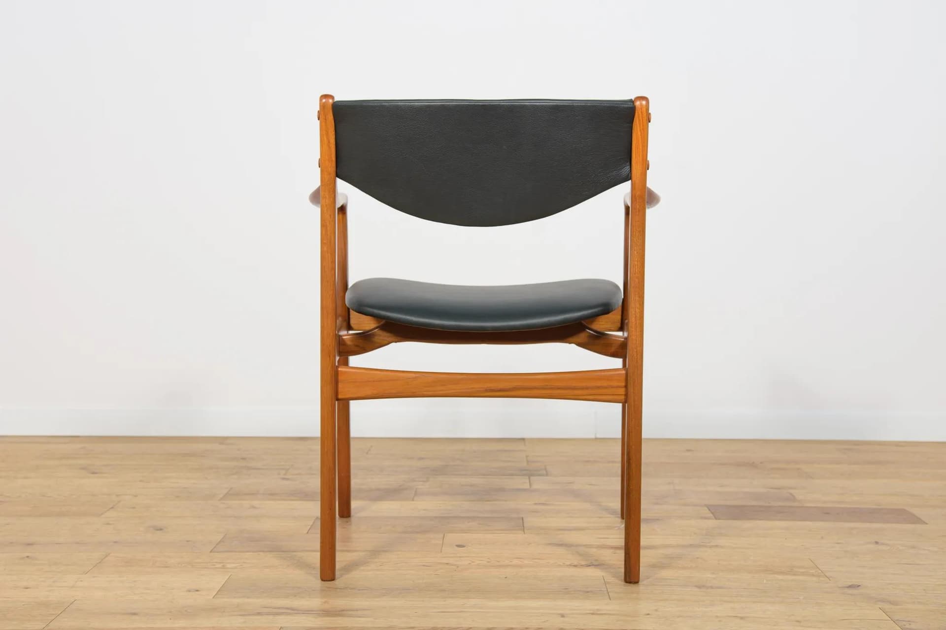 Armchair, brown teak, black leather, Denmark, 1960s. - 73835