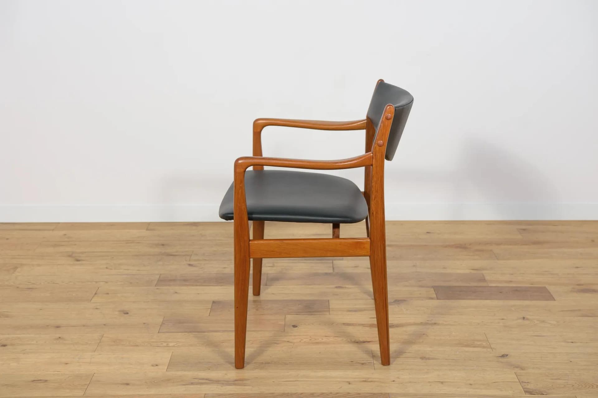 Armchair, brown teak, black leather, Denmark, 1960s. - 73831