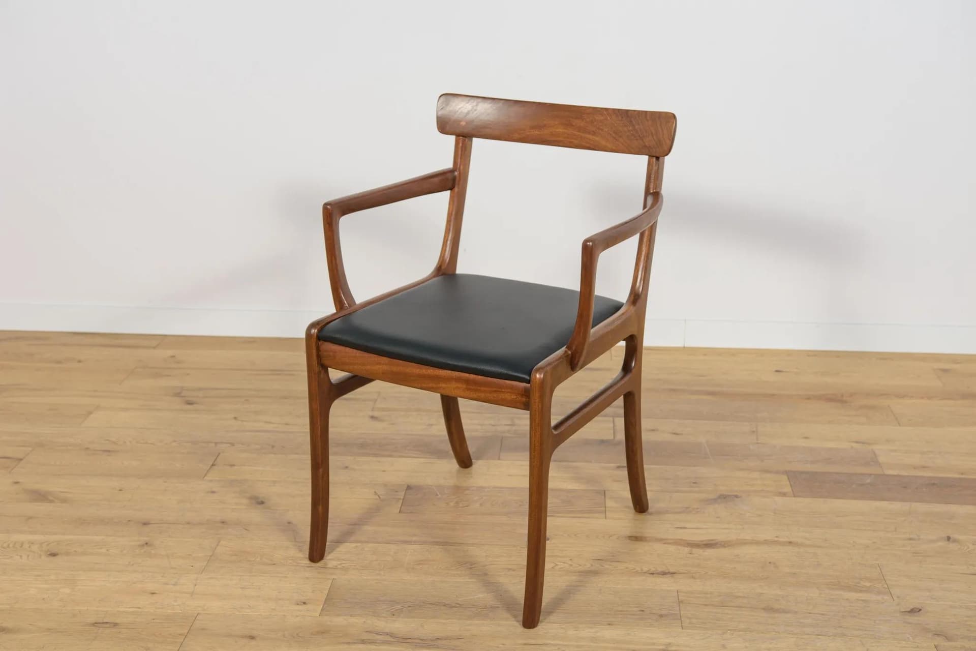 Set of Four Chairs and Two Armchairs Rungstedlund, brown mahogany, black leather, by O. Wanscher, Poul Jeppesens Møbelfabrik, Denmark, 1960s. - 75024