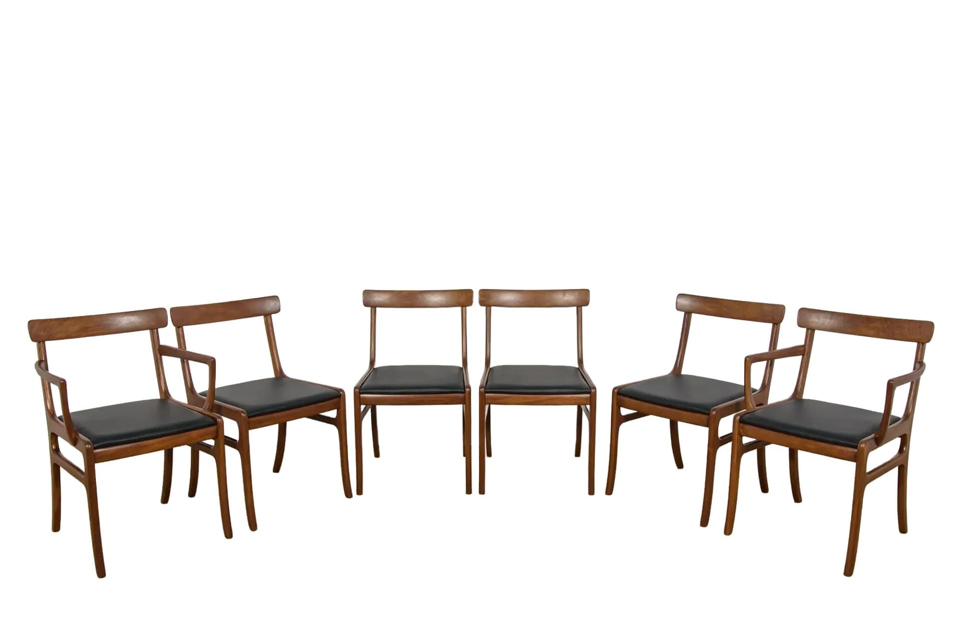 Set of Four Chairs and Two Armchairs Rungstedlund, brown mahogany, black leather, by O. Wanscher, Poul Jeppesens Møbelfabrik, Denmark, 1960s.