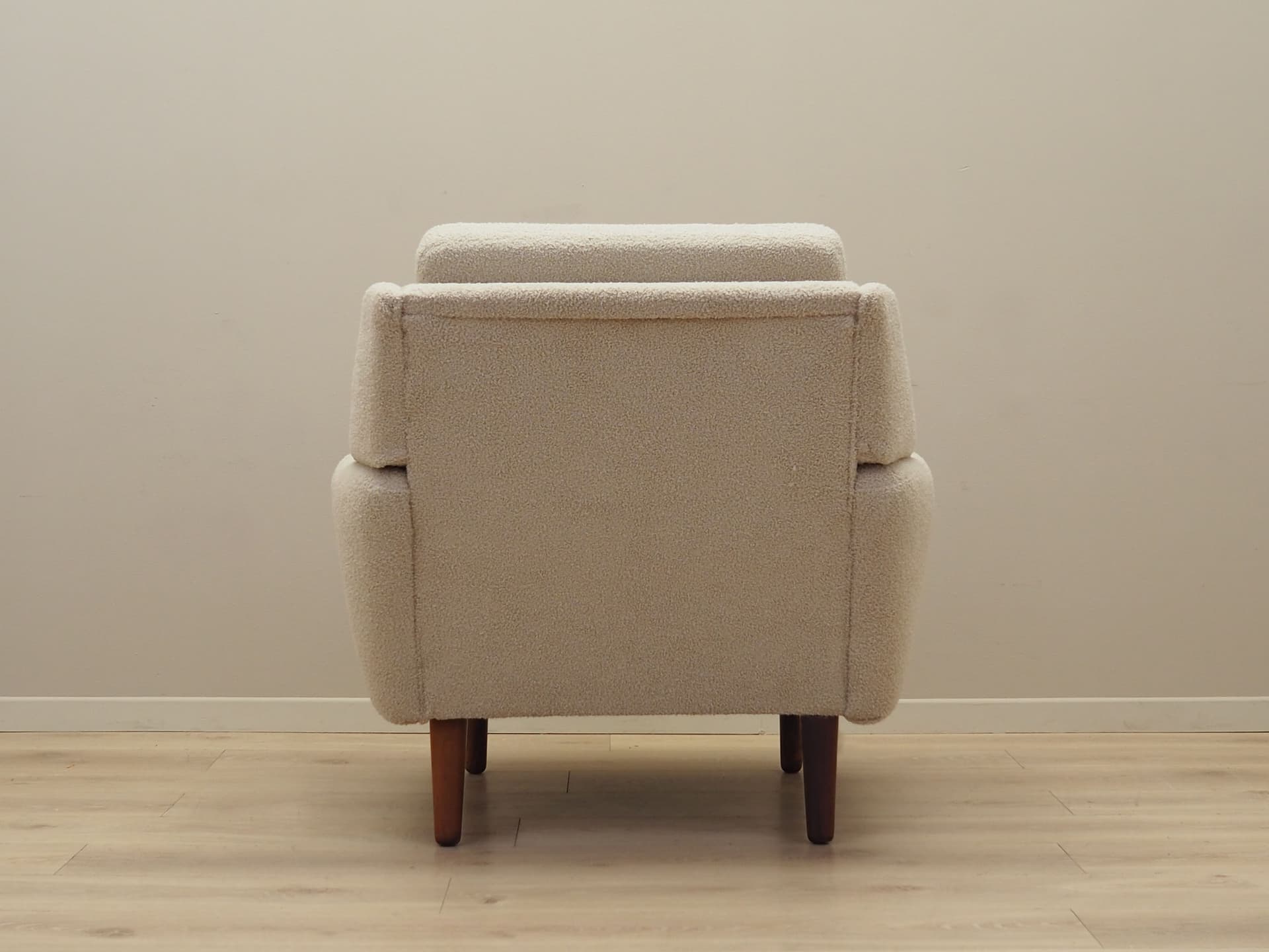 Armchair, ivory bouclé, rosewood, Denmark, 1970s. - 78646