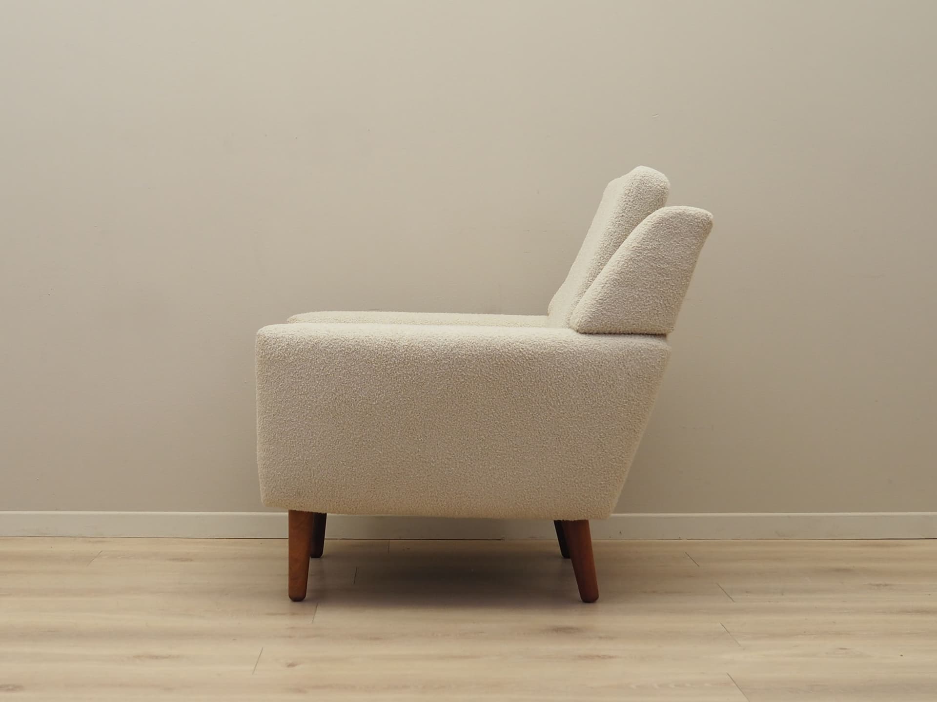 Armchair, ivory bouclé, rosewood, Denmark, 1970s. - 78642