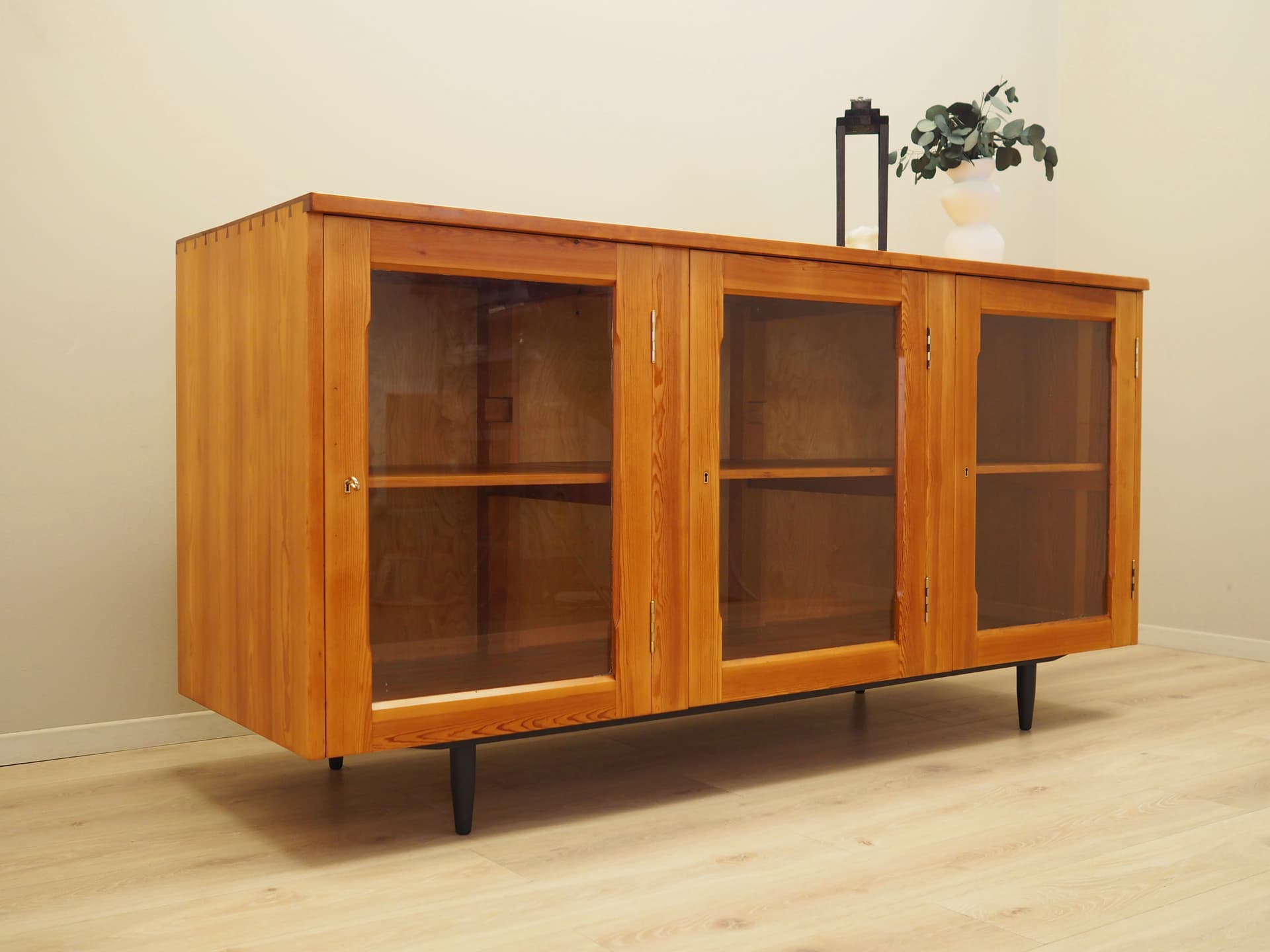 Display cabinet, light brown pine, glass, Denmark, 1980s. - 79048