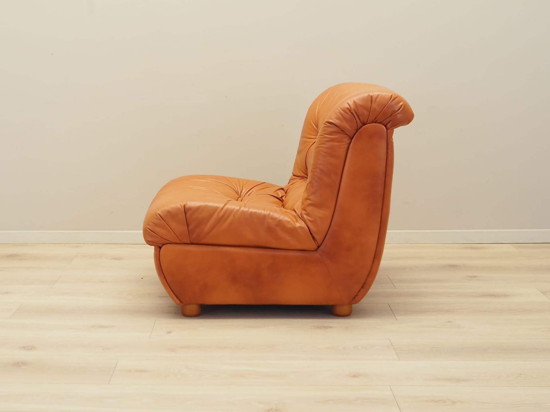 Armchair, orange, natural leather, Italy, 1970s. - 81705