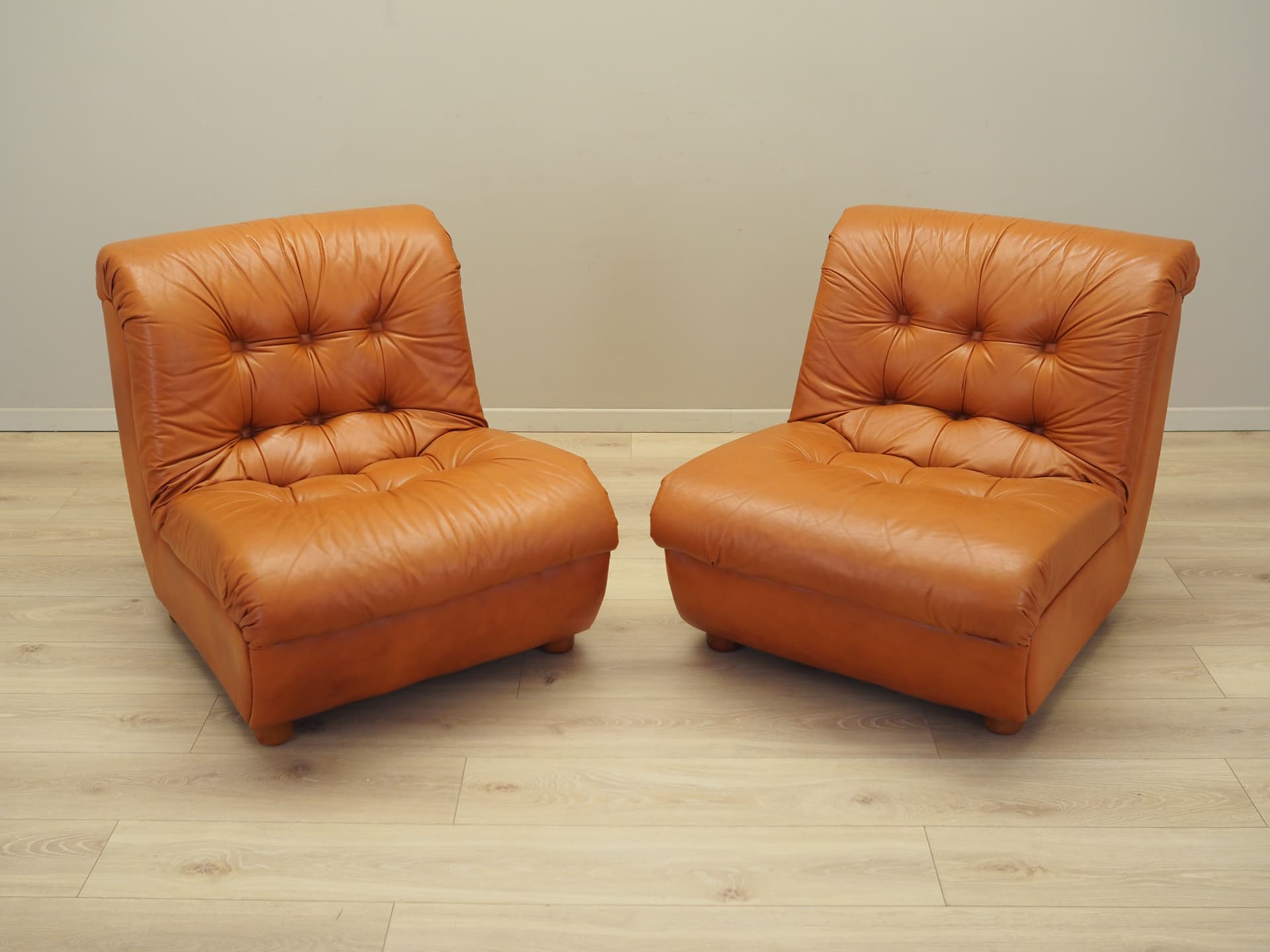 Armchair, orange, natural leather, Italy, 1970s. - 81716