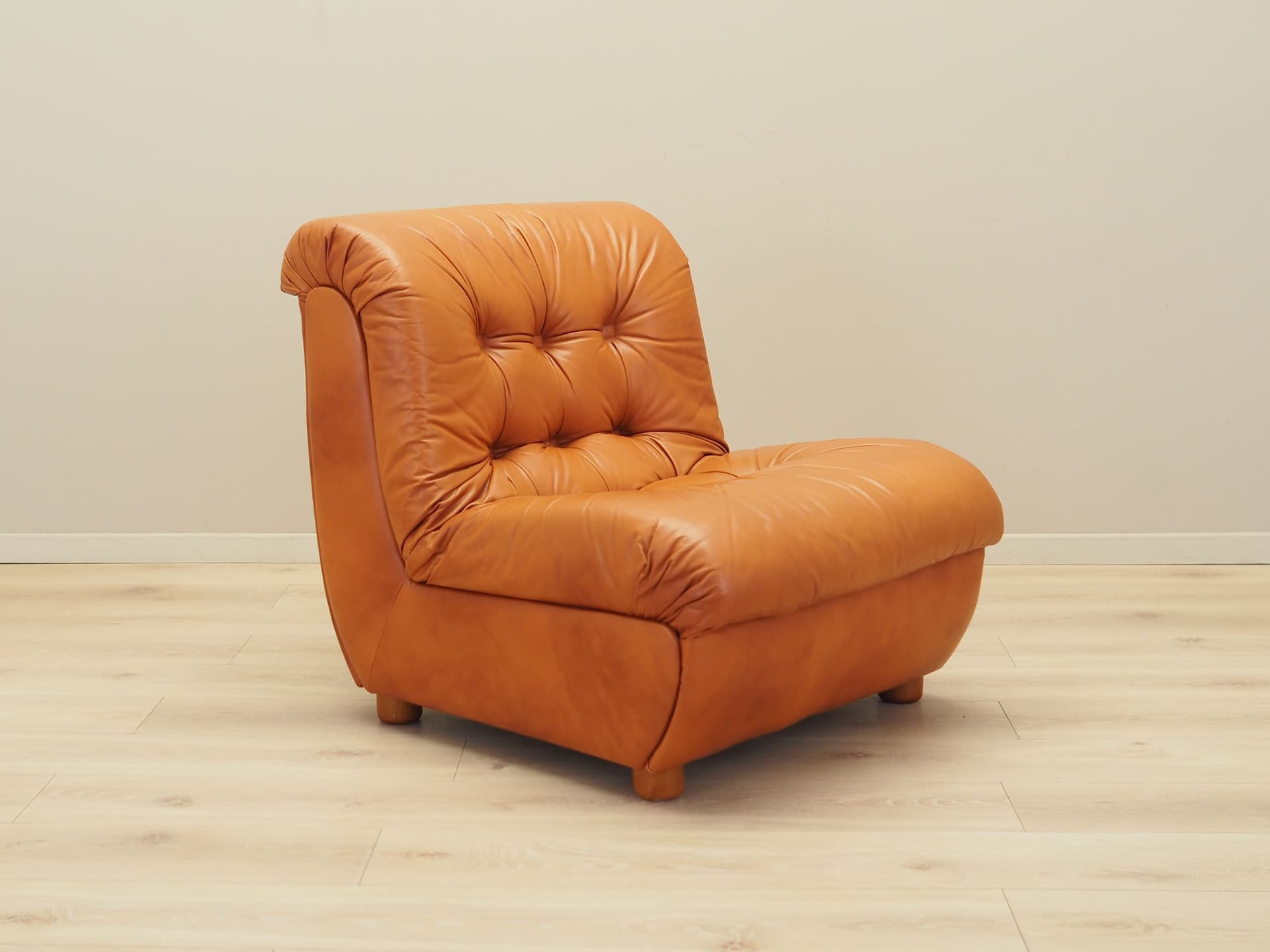 Armchair, orange, natural leather, Italy, 1970s. - 81709