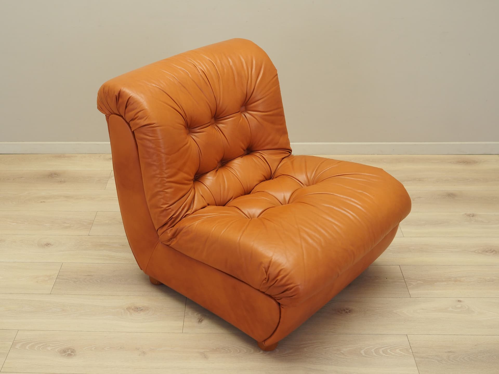 Armchair, orange, natural leather, Italy, 1970s. - 81710