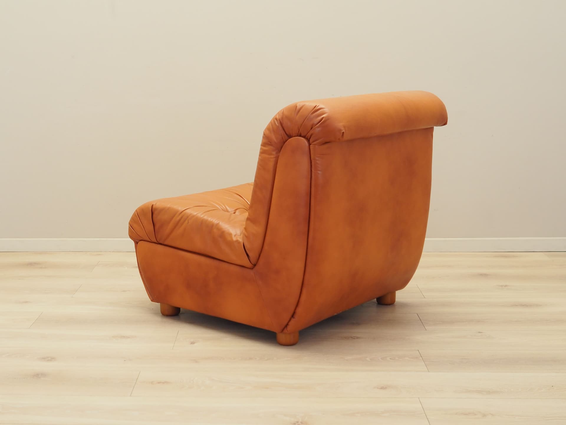 Armchair, orange, natural leather, Italy, 1970s. - 81706