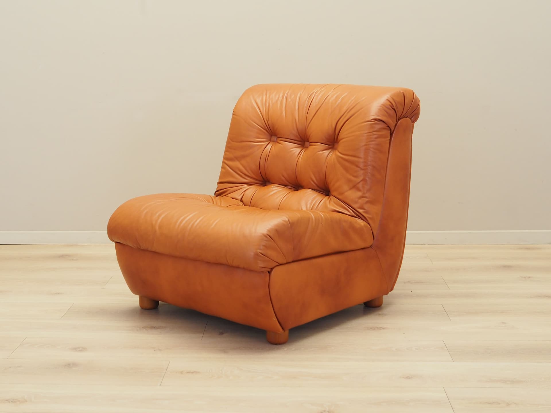 Armchair, orange, natural leather, Italy, 1970s. - 81703