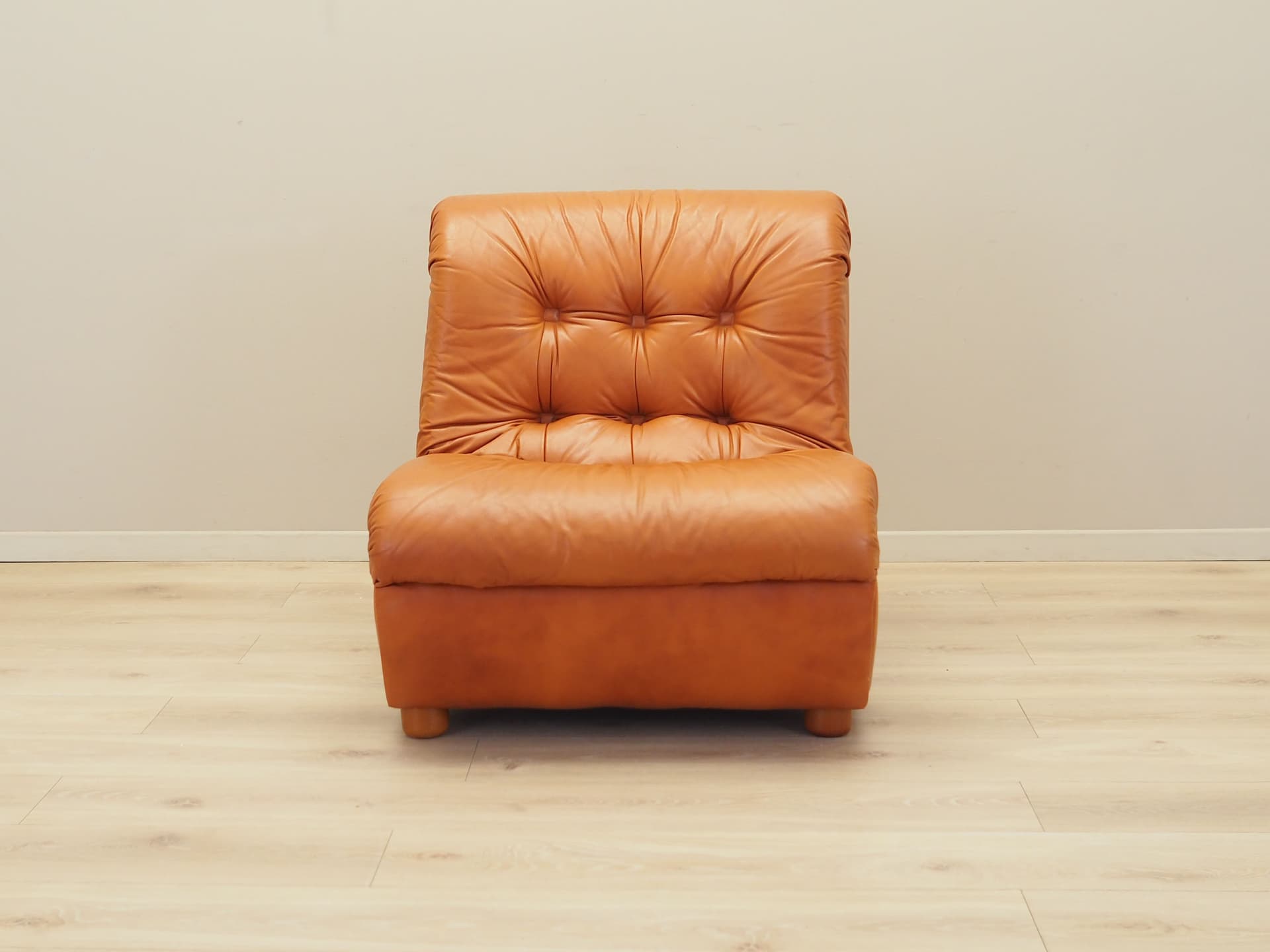 Armchair, orange, natural leather, Italy, 1970s. - 81704