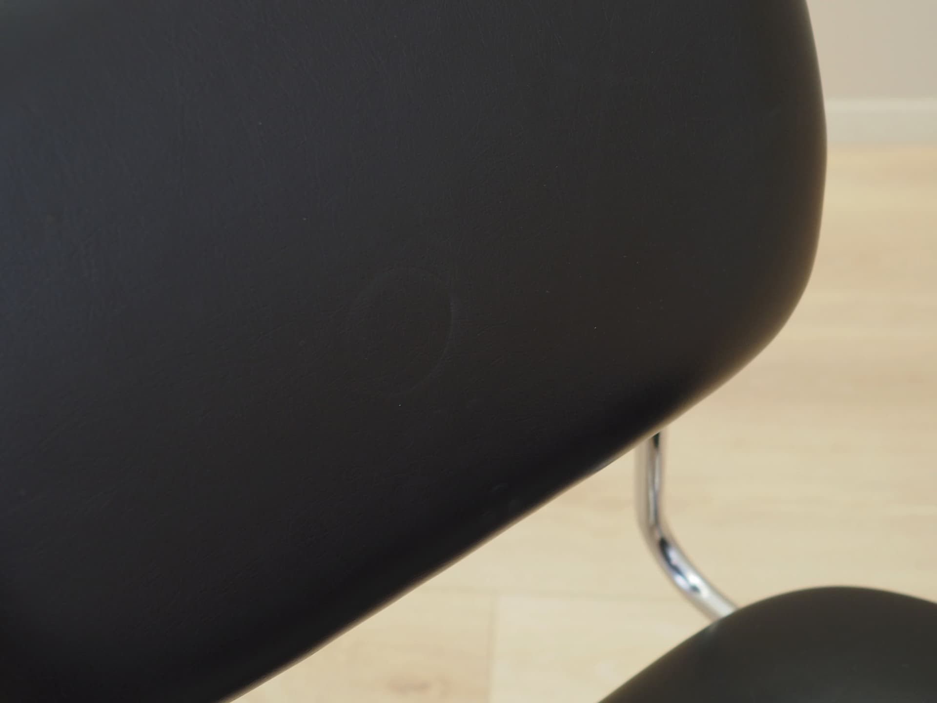 Chair, black, artificial leather, chromed metal, Italy, 1970s. - 82880