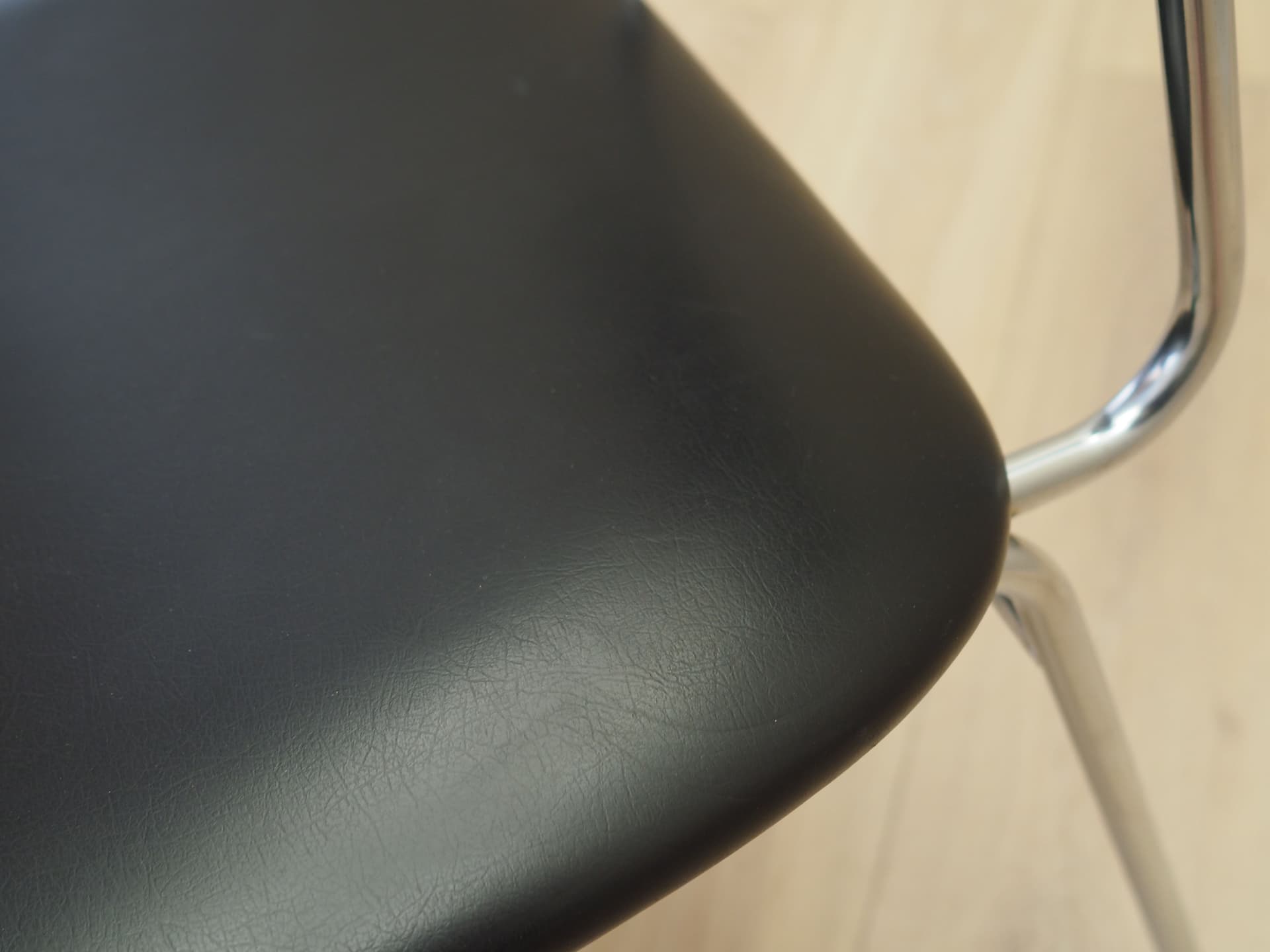 Chair, black, artificial leather, chromed metal, Italy, 1970s. - 82882