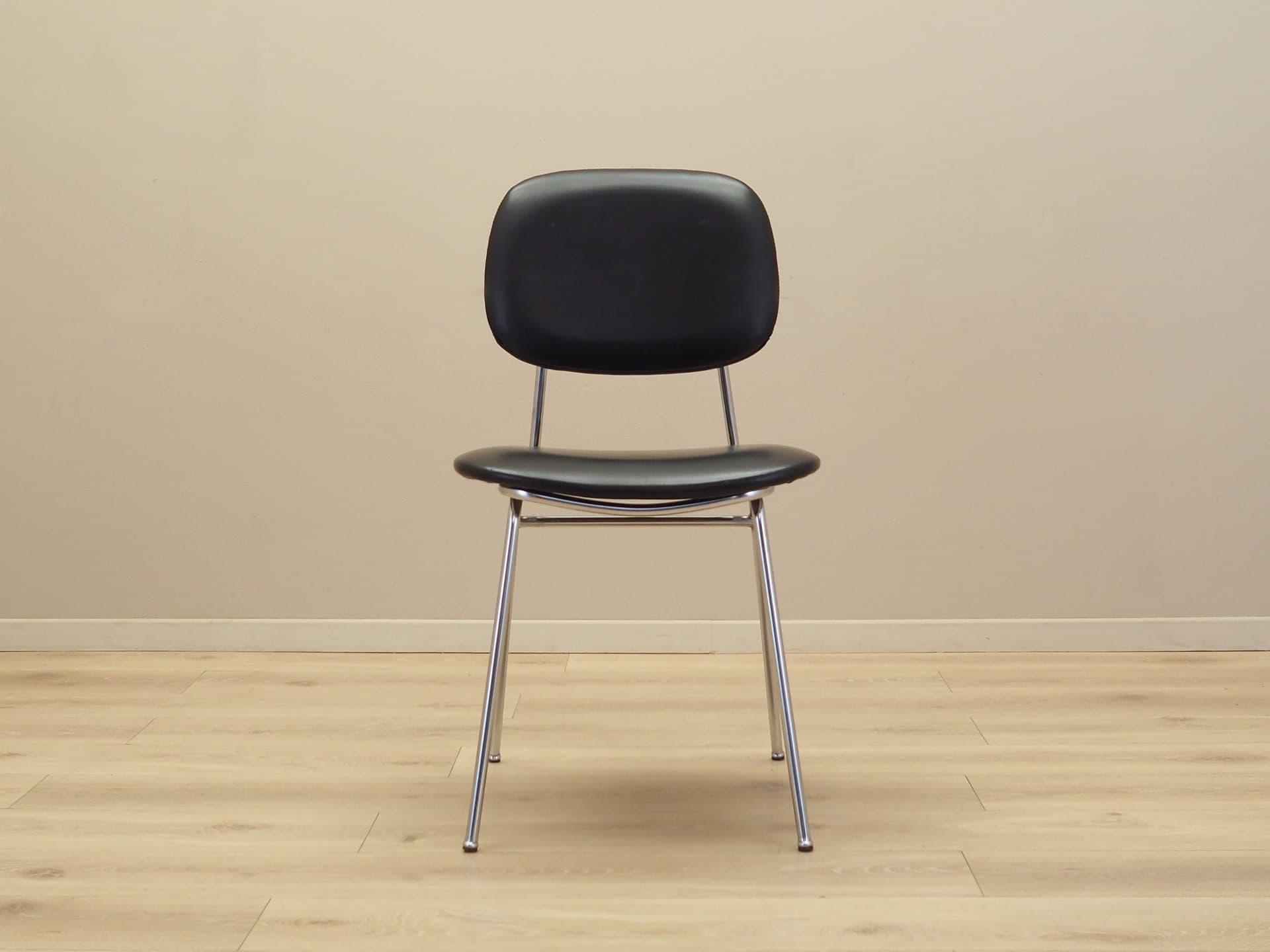 Chair, black, artificial leather, chromed metal, Italy, 1970s. - 82872