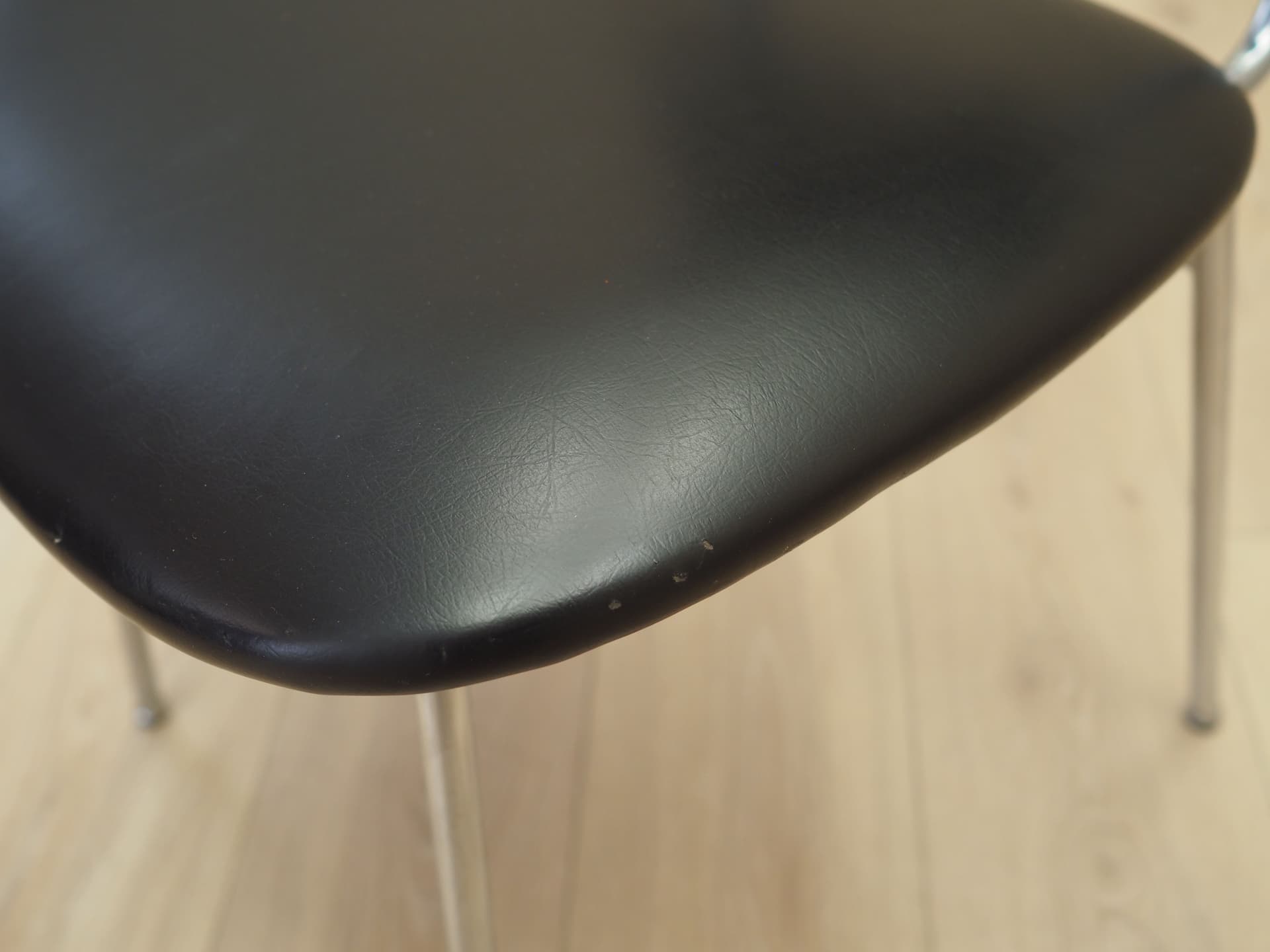 Chair, black, artificial leather, chromed metal, Italy, 1970s. - 82881