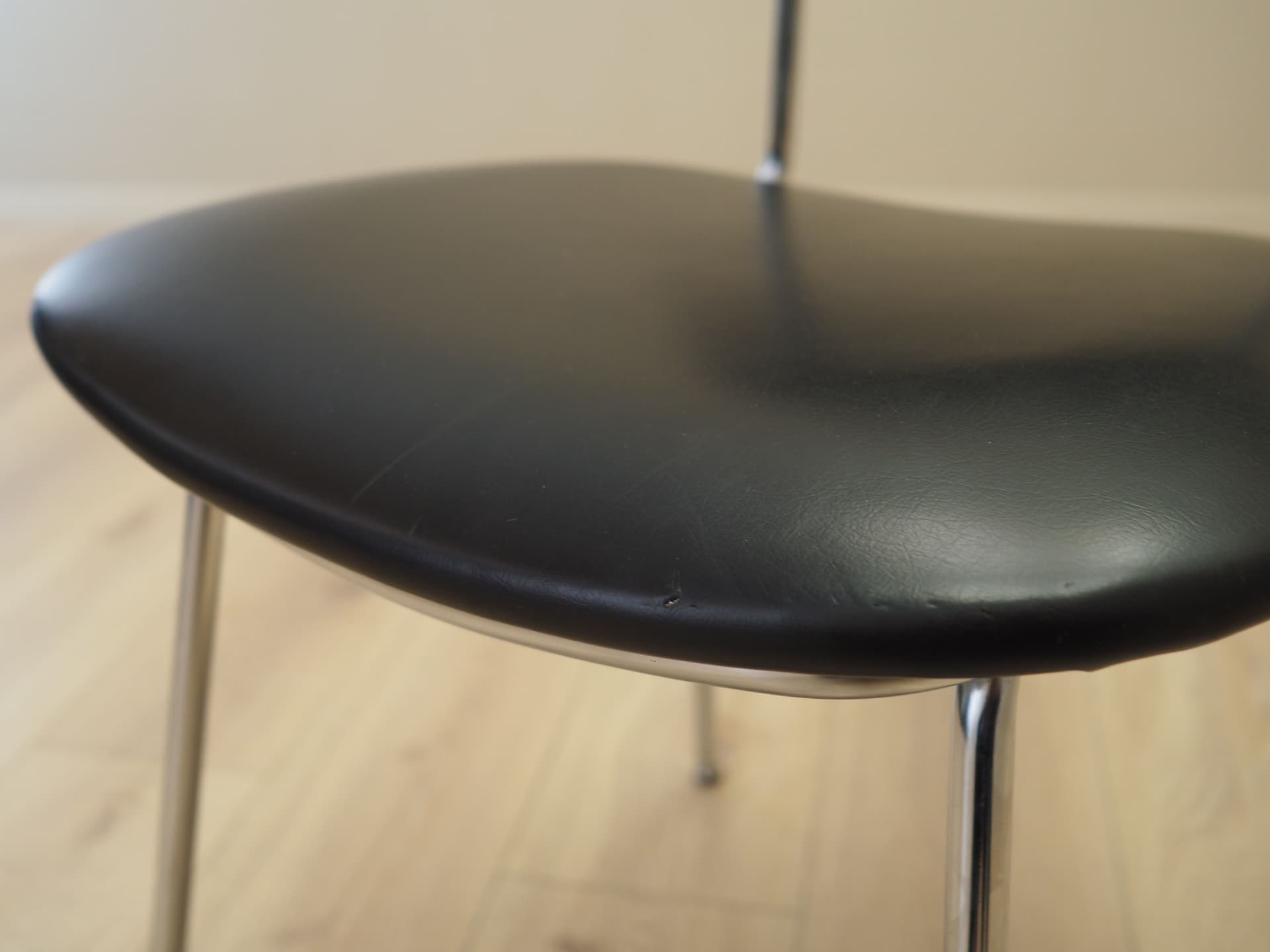 Chair, black, artificial leather, chromed metal, Italy, 1970s. - 82883