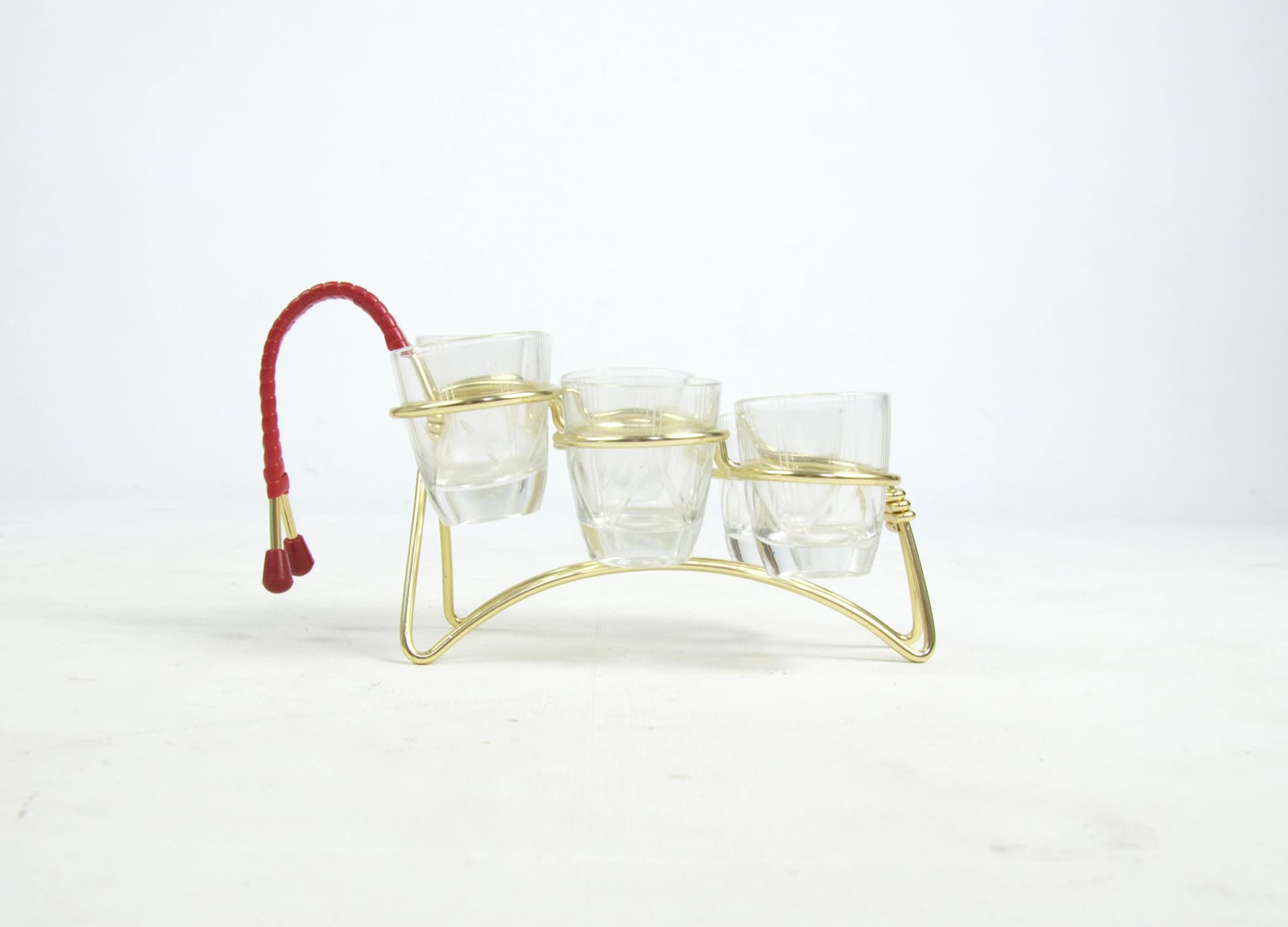 Set of shot glasses with stand, transparent glass, gold metal, Poland, 1960s. - 86724