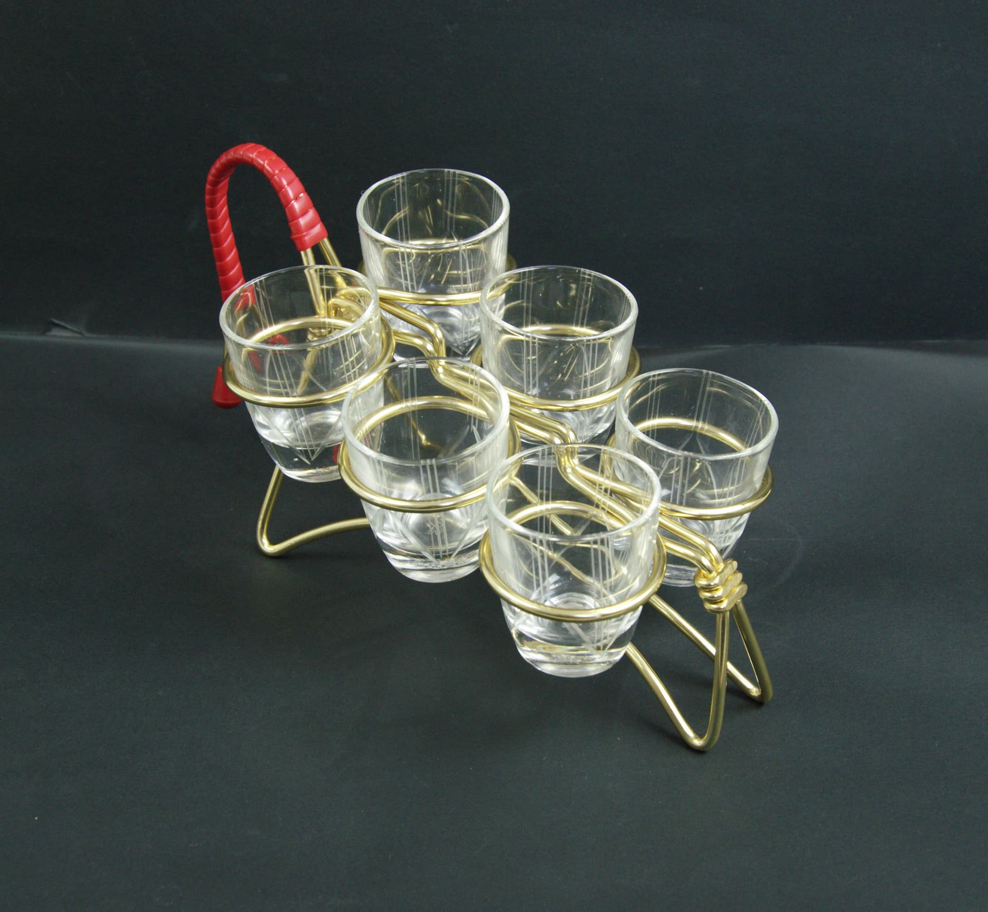 Set of shot glasses with stand, transparent glass, gold metal, Poland, 1960s. - 86726